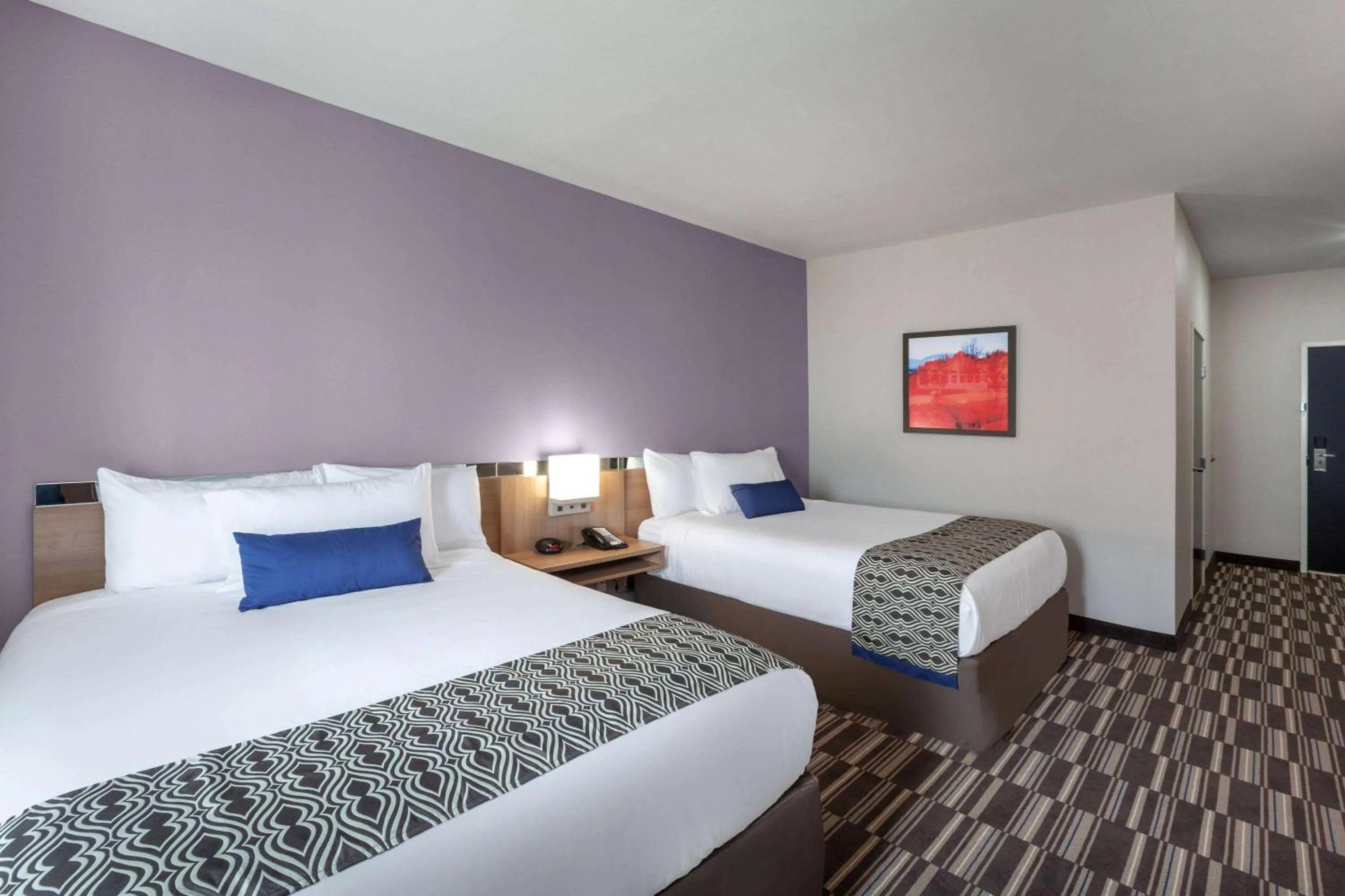 Queen Room with Two Queen Beds - Non-Smoking in Microtel Inn & Suites by Wyndham College Station