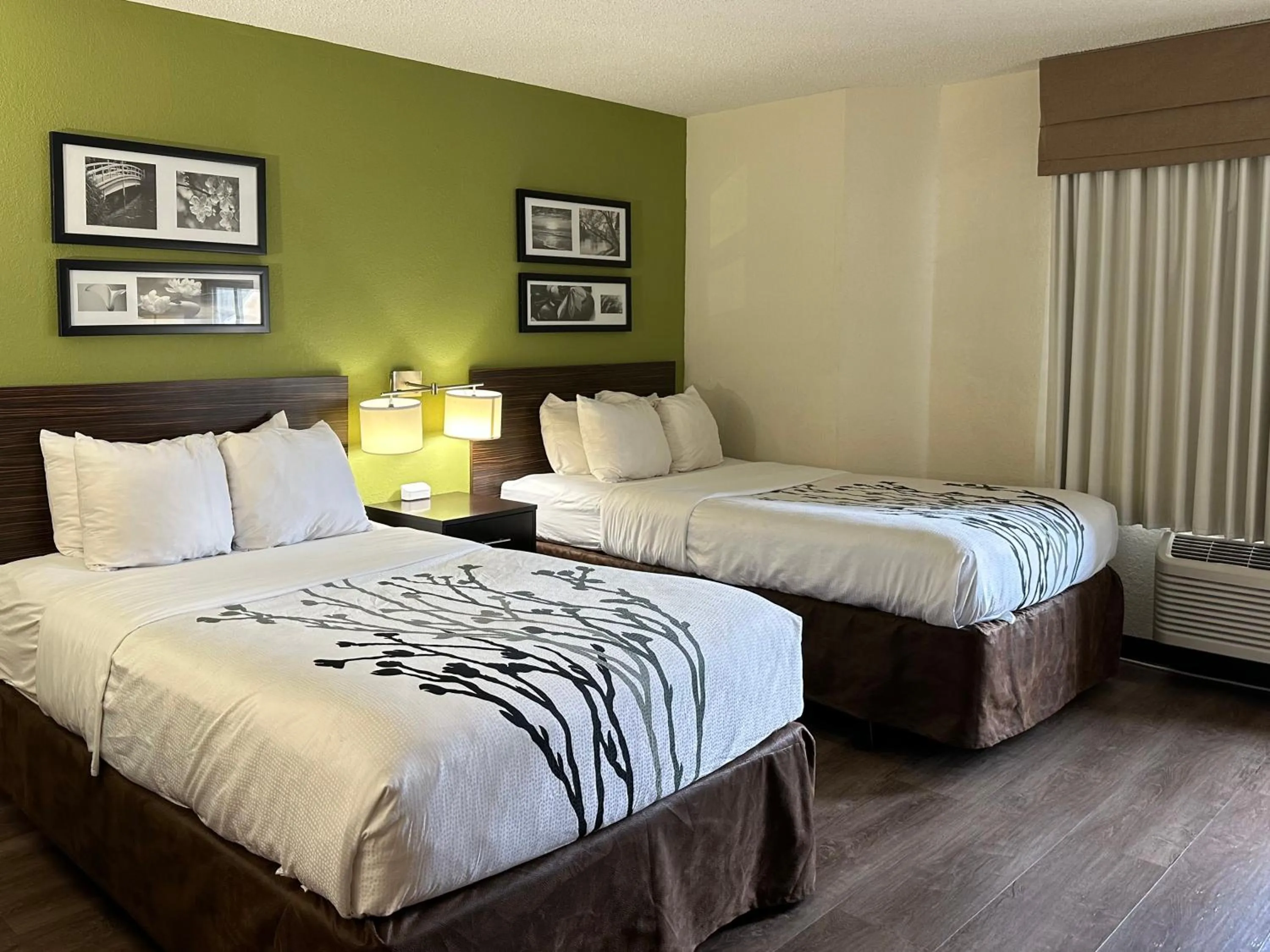 Suite with One King Bed and Two Double Beds - Non-Smoking in Sleep Inn & Suites Near Columbus - State University Area