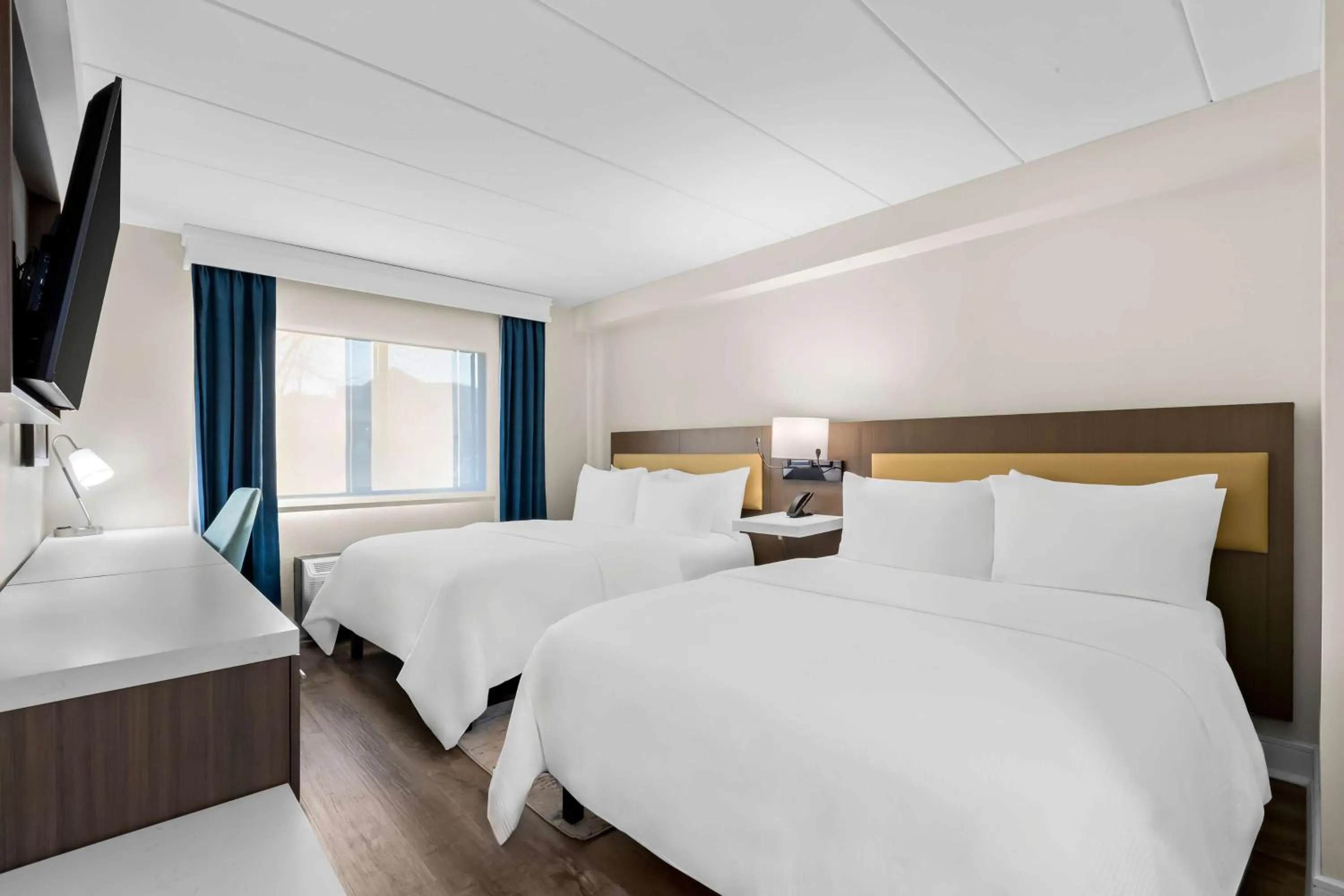 Two-Room Queen Suite with Two Queen Beds, Sofa Bed, Kitchen and Walk-In Shower - Non-Smoking in Latitude Suites Tinton Falls Eatontown - BW Premier Collection