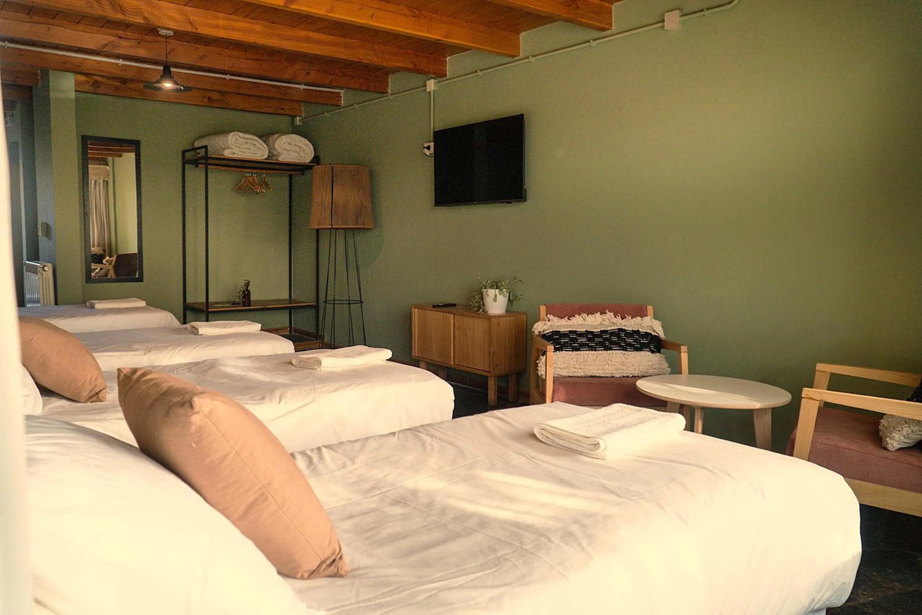 Quadruple Room in Pioneros Suites by Grupo Tierra Gaucha