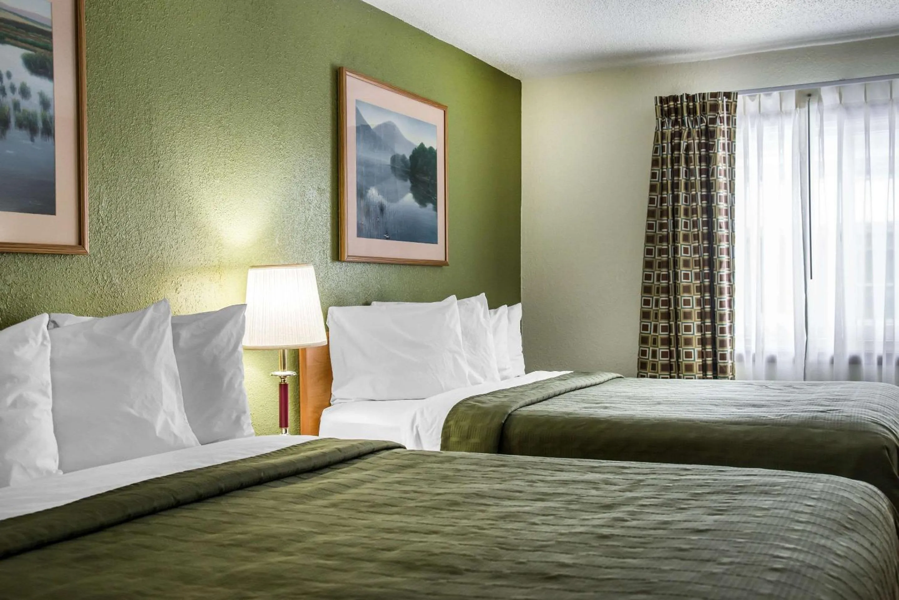 Queen Room with Two Queen Beds - Non-Smoking in Hudson Inn & Suites