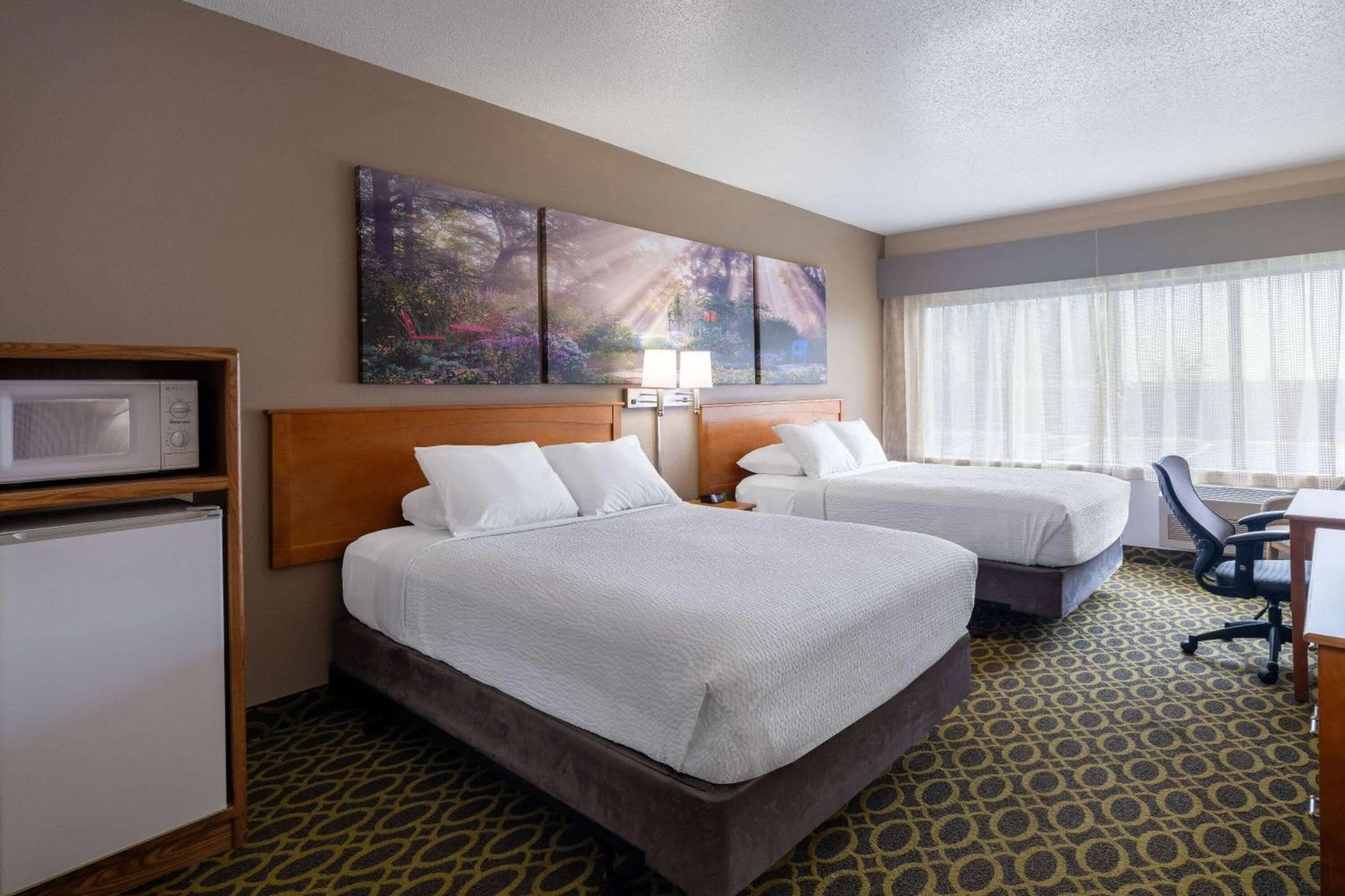 Queen Room with Two Queen Beds - Mobility Access/Non-Smoking in Days Inn & Suites by Wyndham Madison