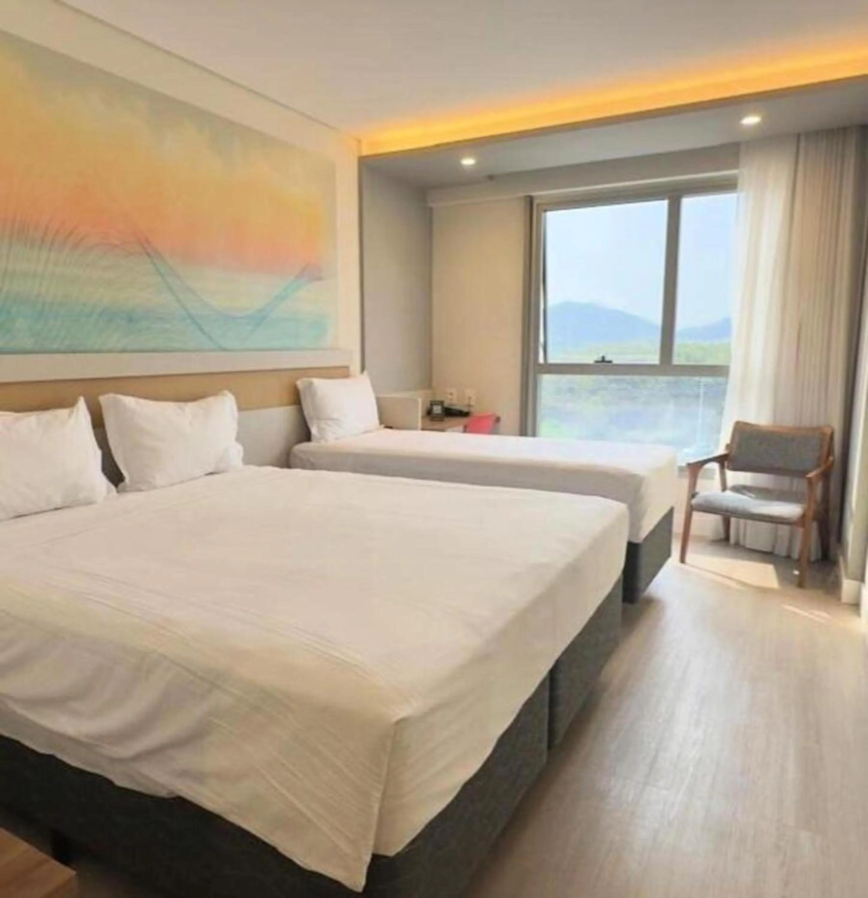 Standard Triplo - 1 Cama Queen e 1 Cama Solteiro in Intercity Portofino Florianópolis