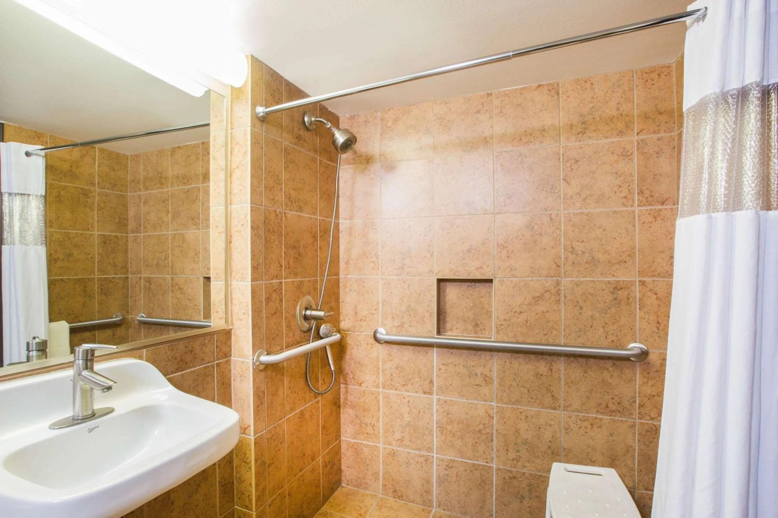 Queen Room - Mobility Access/Non-Smoking in Ramada by Wyndham Des Moines Tropics Resort & Conference Ctr