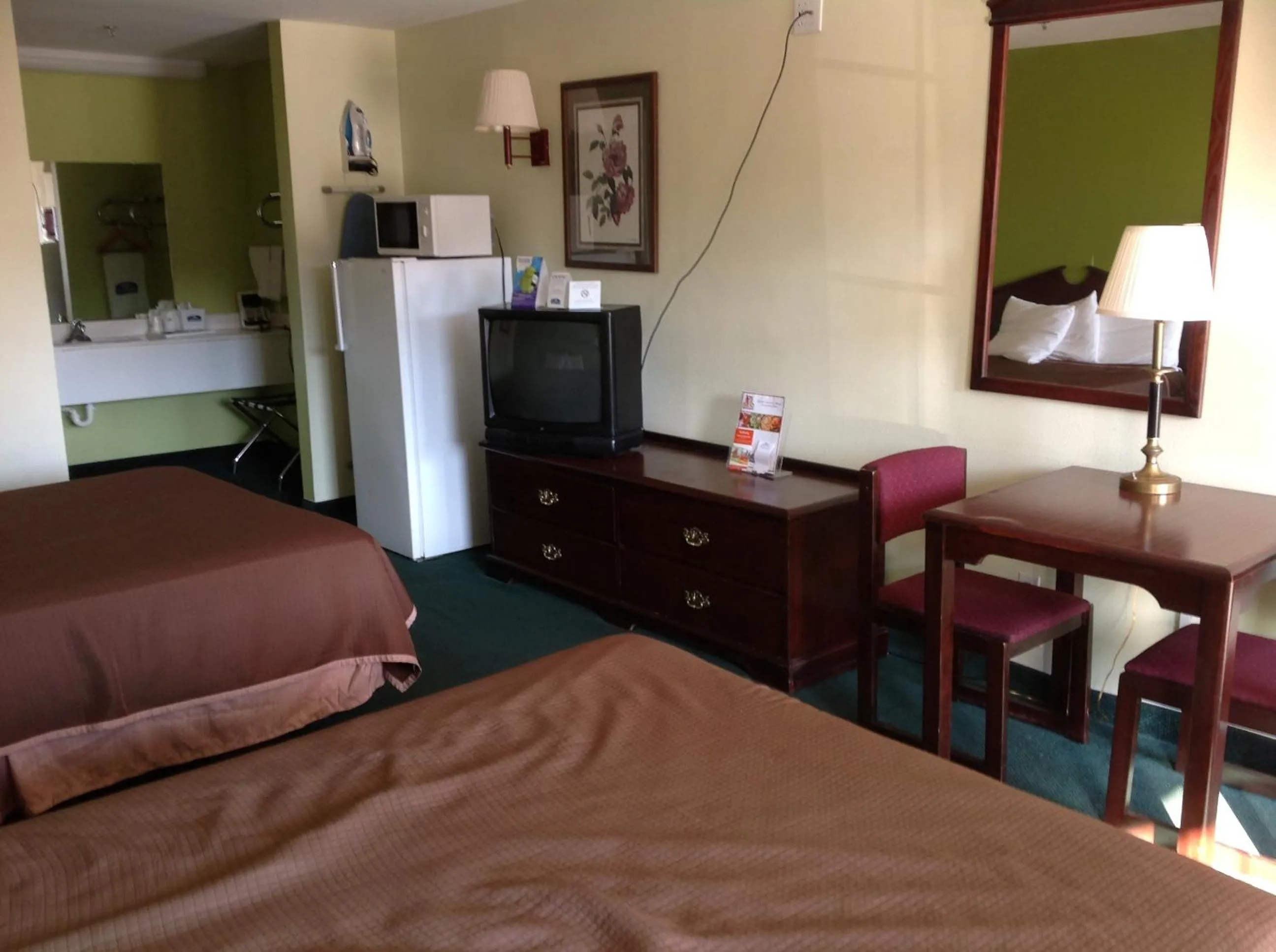Queen Room with Two Queen Beds - Non-Smoking in Howard Johnson by Wyndham Grand Prairie Near Lone Star Park