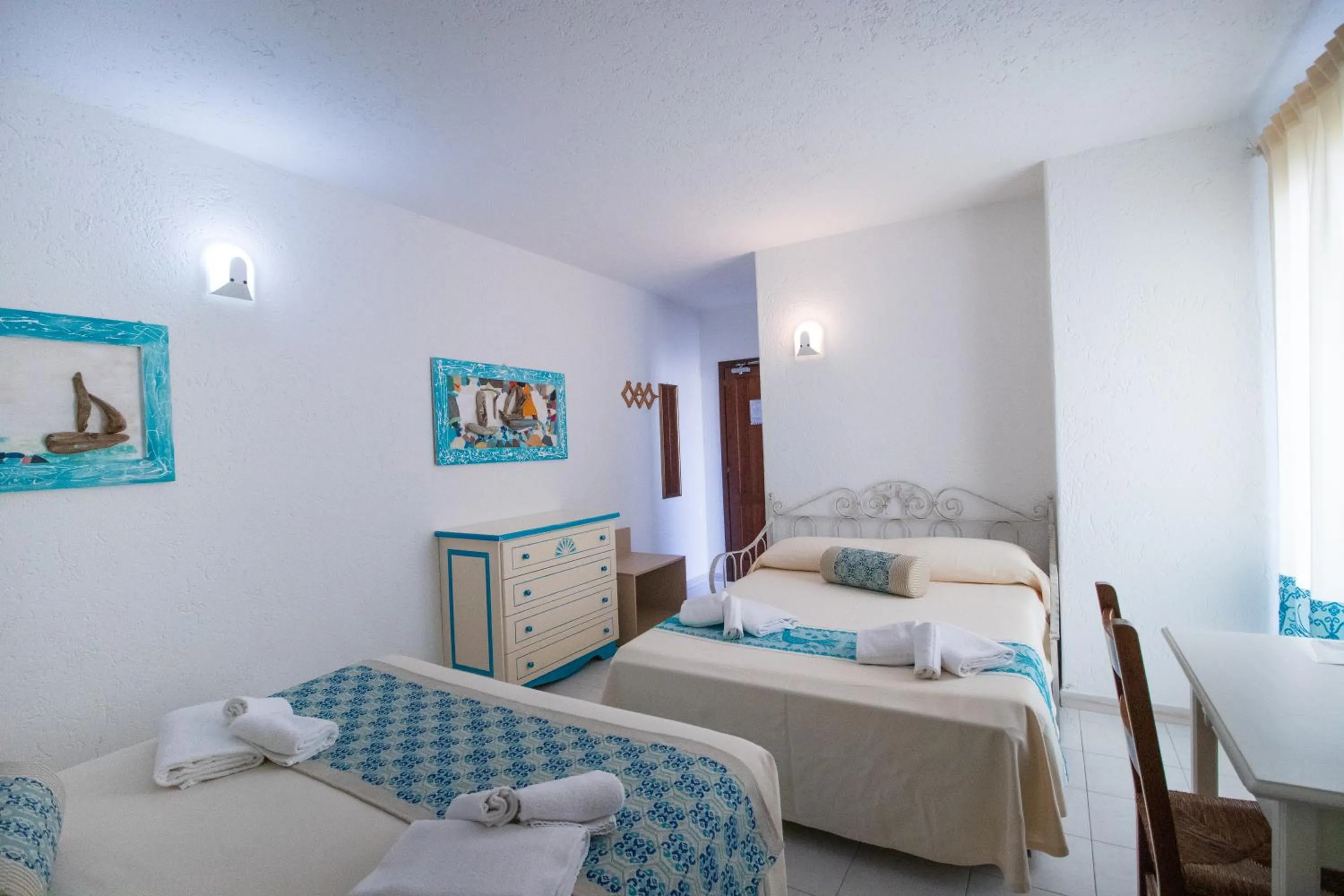 Quadruple Room with Balcony - single occupancy in Hotel Canne al Vento