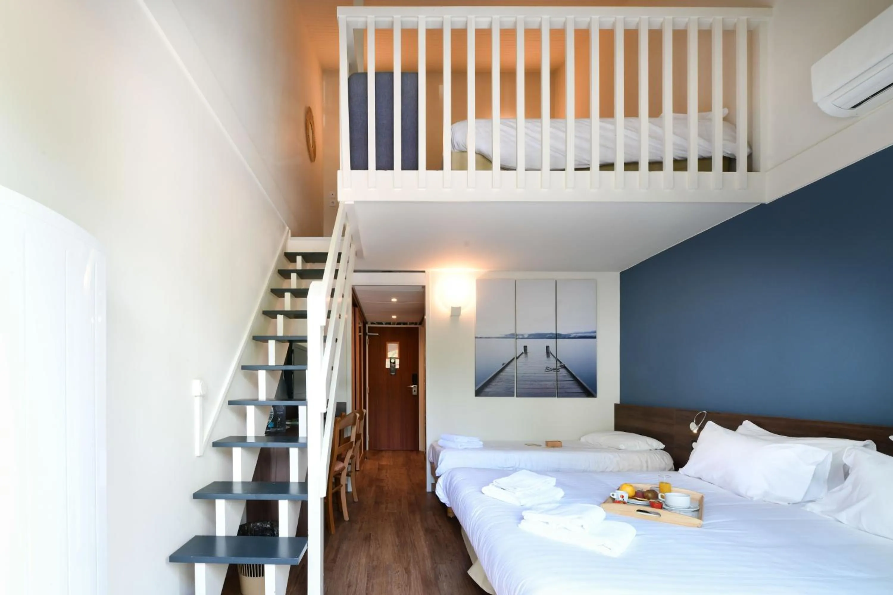 Quadruple Room in Hotel Logis Lacotel