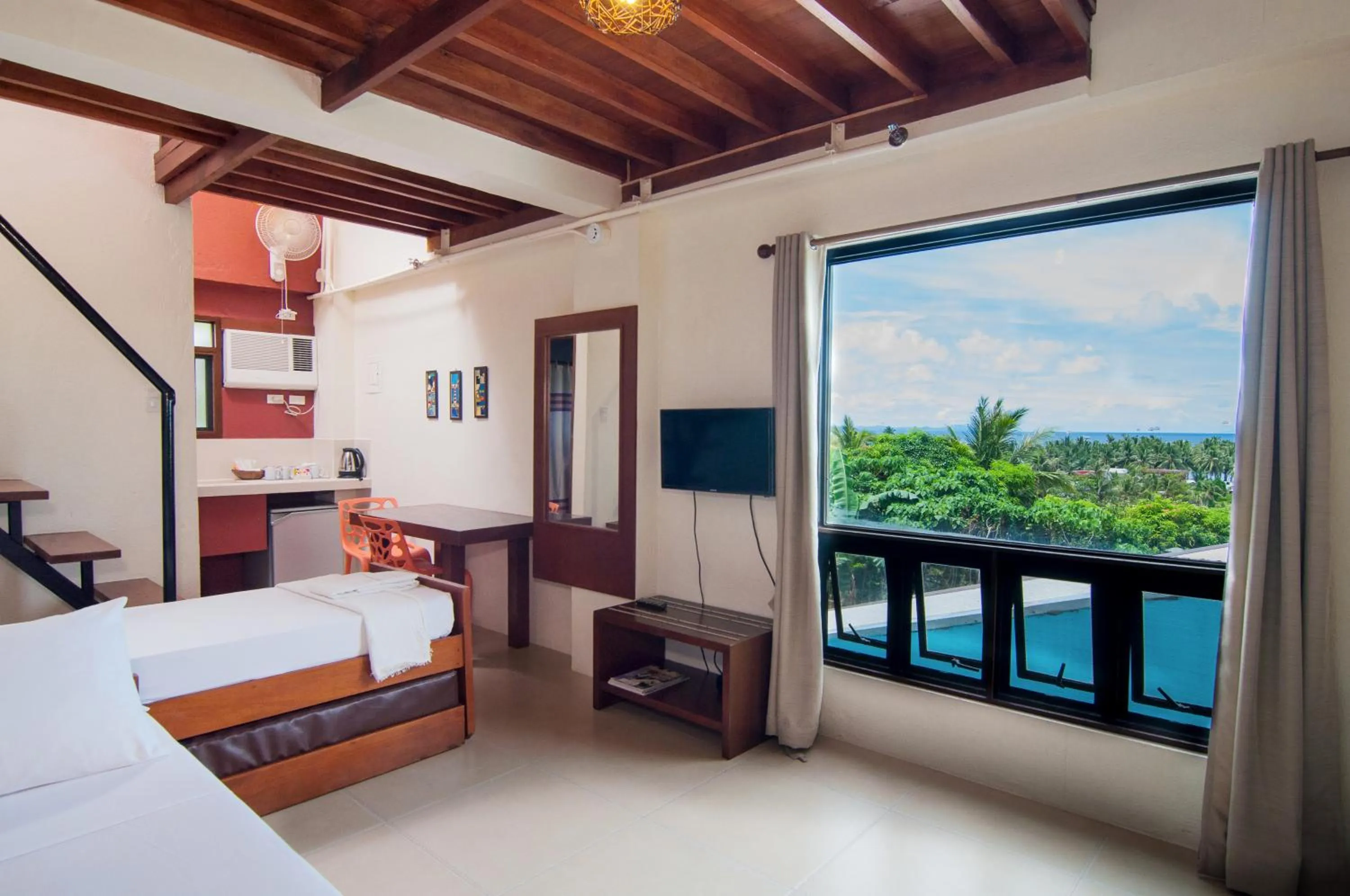 Family Room with Sea View in Agos Boracay Rooms + Beds