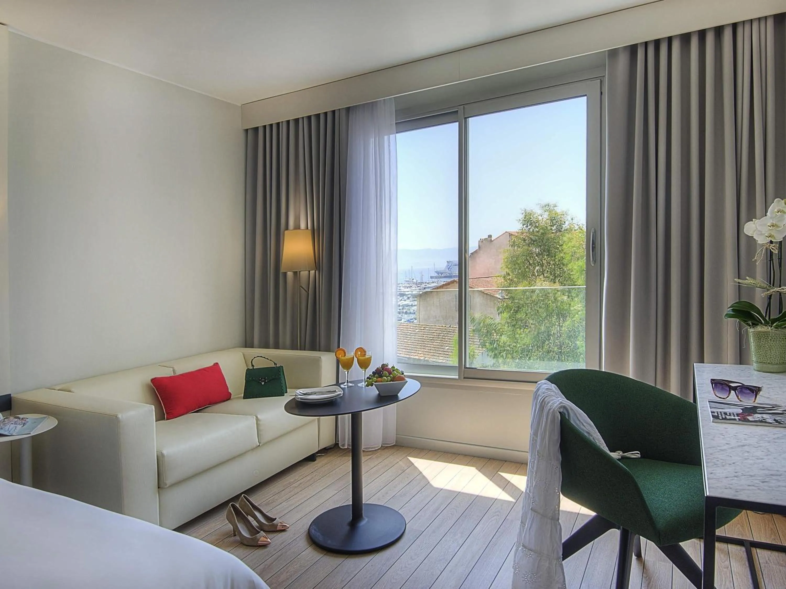 Privilege Room with One Queen Bed and 1 Sofa Bed in Mercure Ajaccio