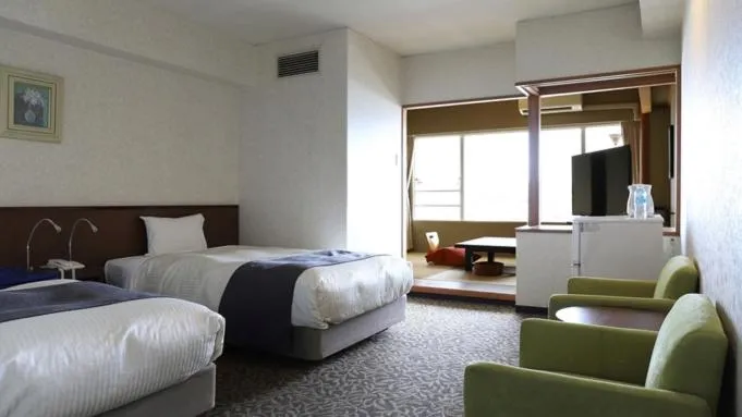 Superior Twin Room with Tatami Area - City Night View - Non-Smoking - Private Bathroom in Ooedo Onsen Monogatari Nagasaki Hotel Seifu