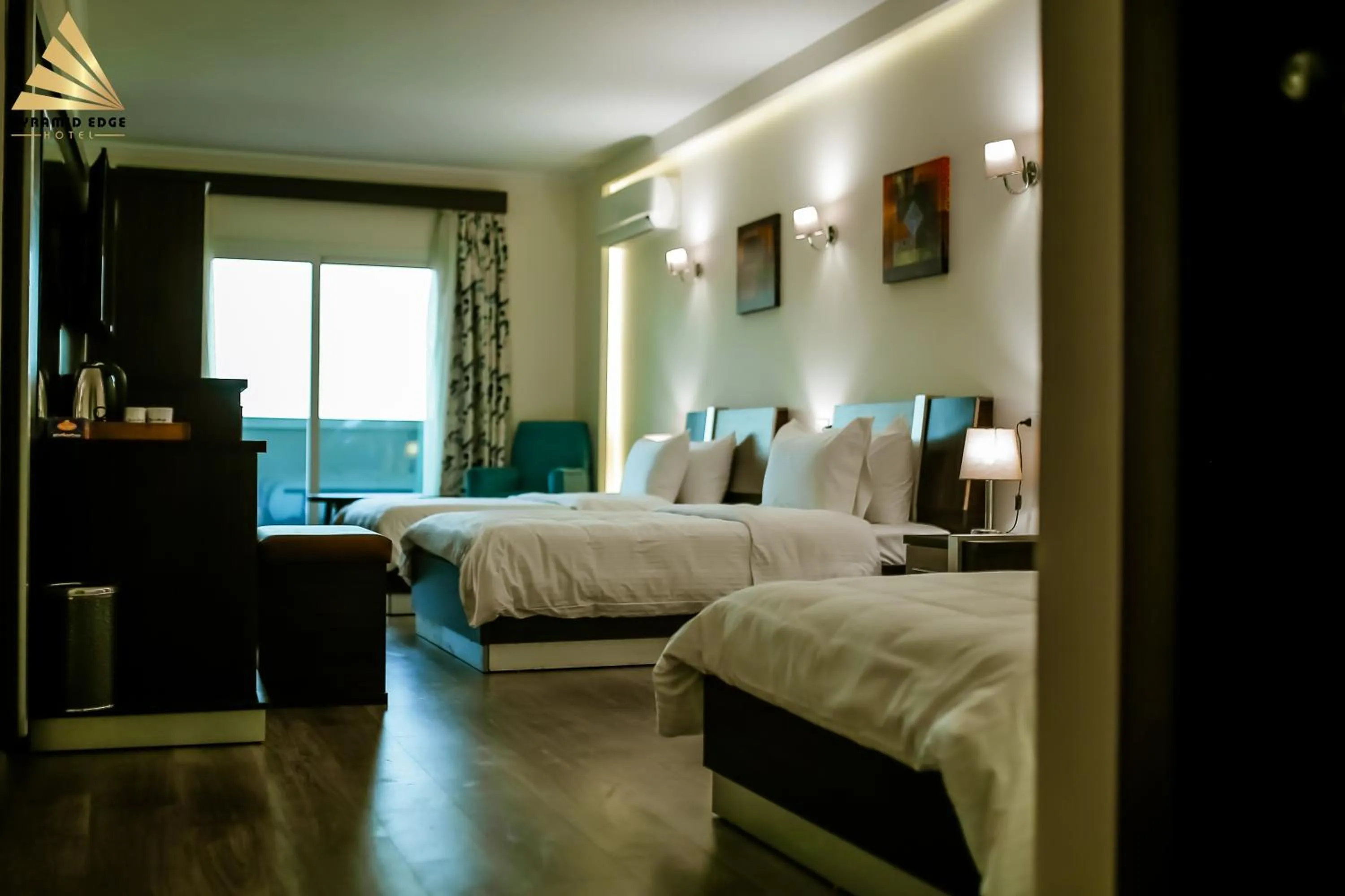 Deluxe Triple Room Pyramids View & Balcony in Pyramid Edge Hotel & Exclusive Pyramids View Rooftop