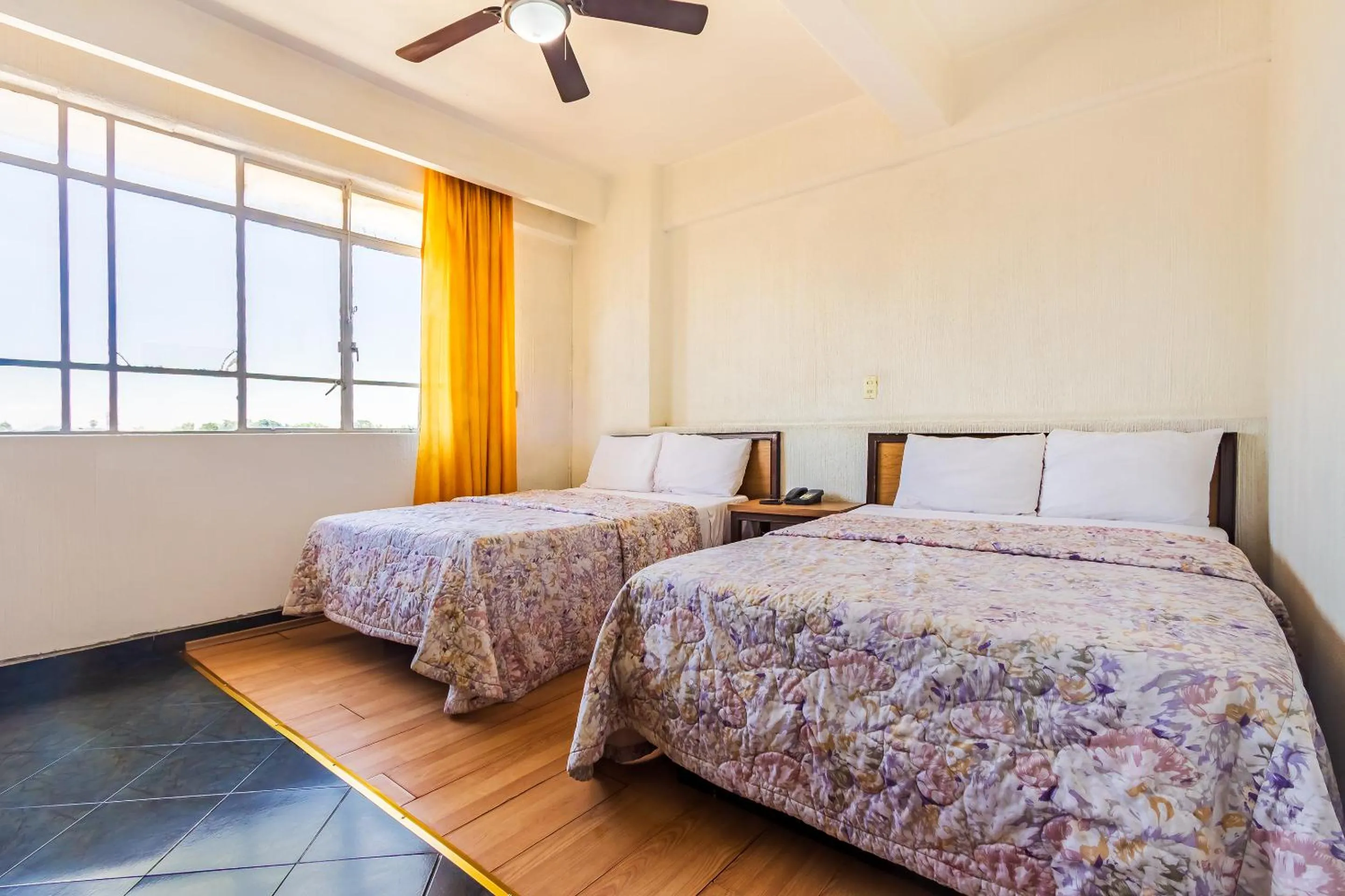 Standard Double Room with Two Double Beds in Capital O Nueva Galicia, Guadalajara centro downtown