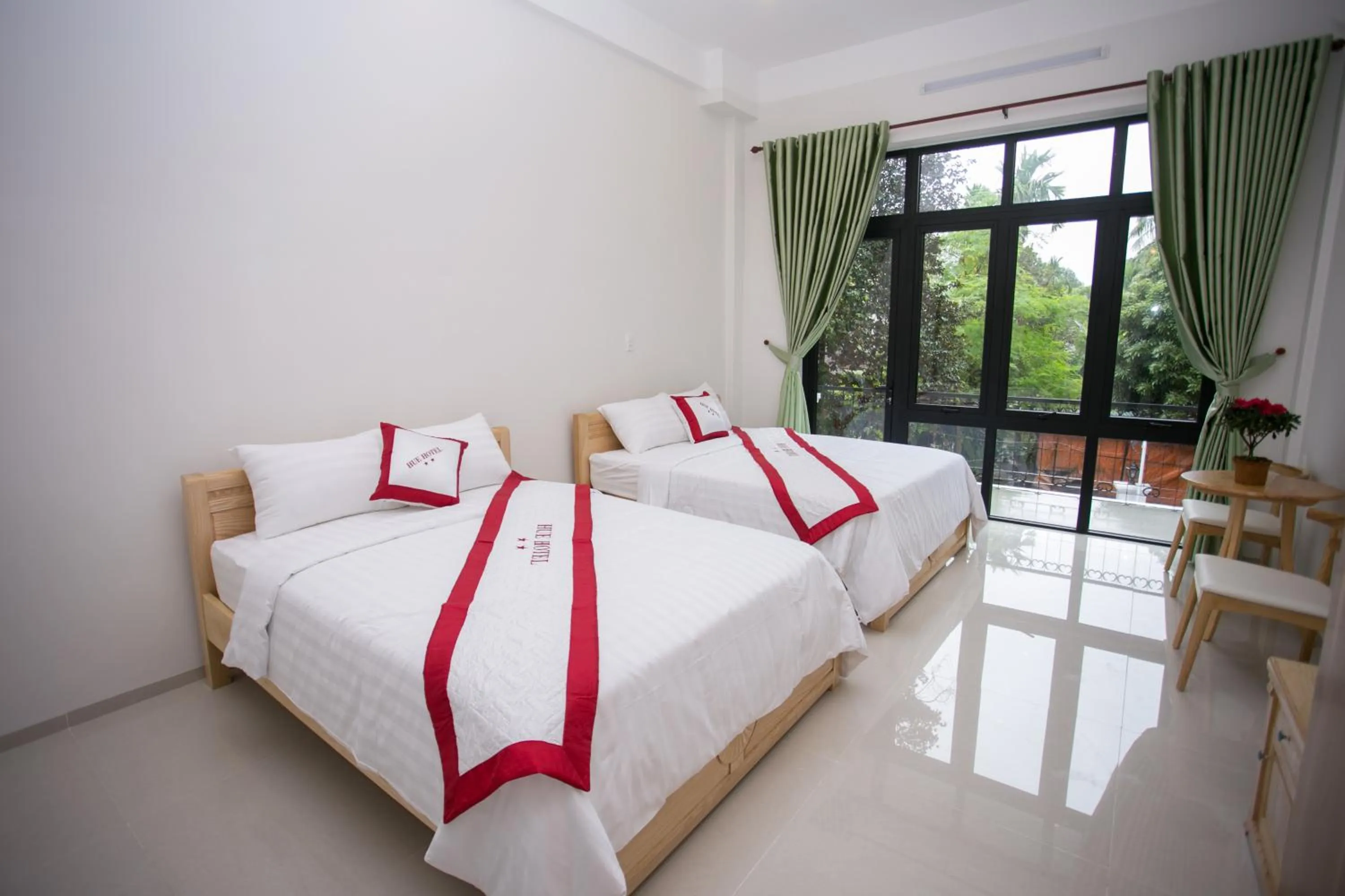 Family Room with Balcony in Hue Classic Hotel