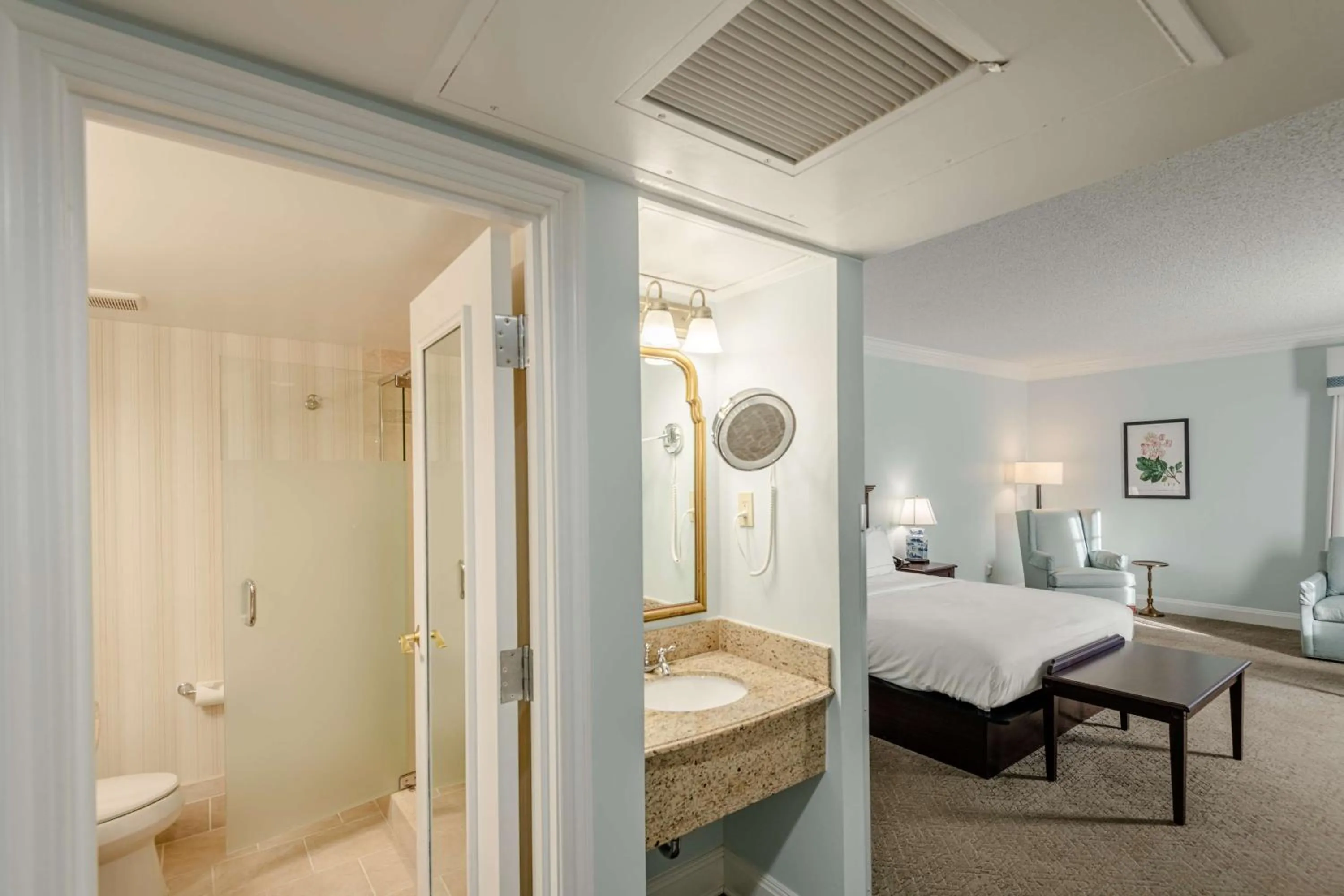 King Suite with Fireplace in The Founders Inn & Spa Tapestry Collection By Hilton