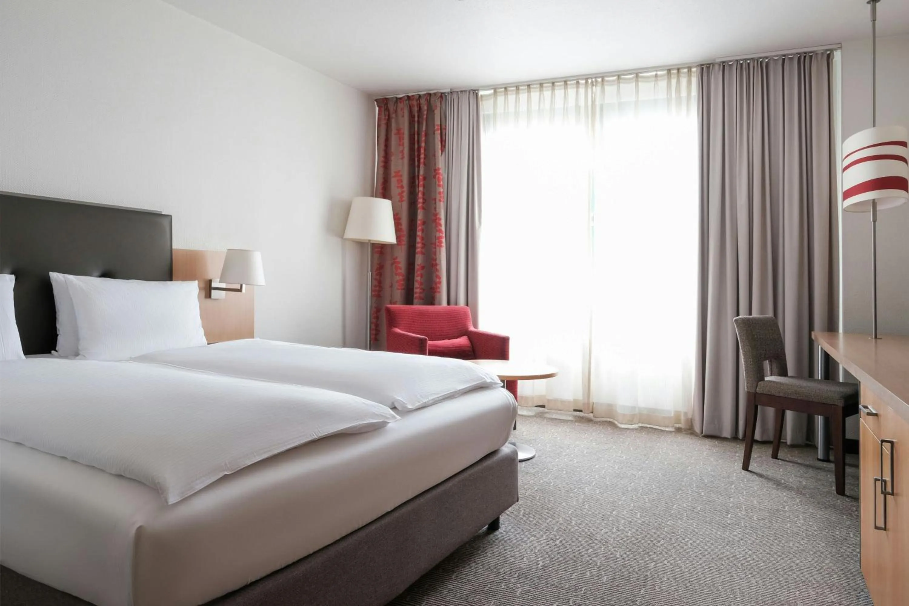 Photo of the whole room, Bed in FOUR Essen City Centre
