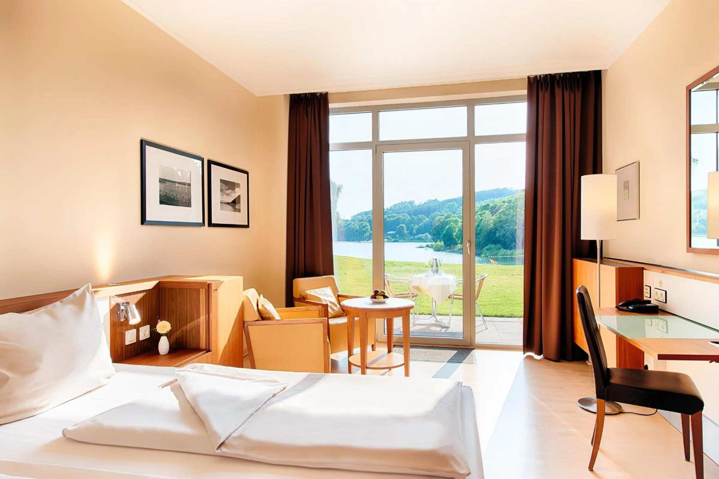 Deluxe Room with Terrace and Lake View in Welcome Hotel Meschede Hennesee