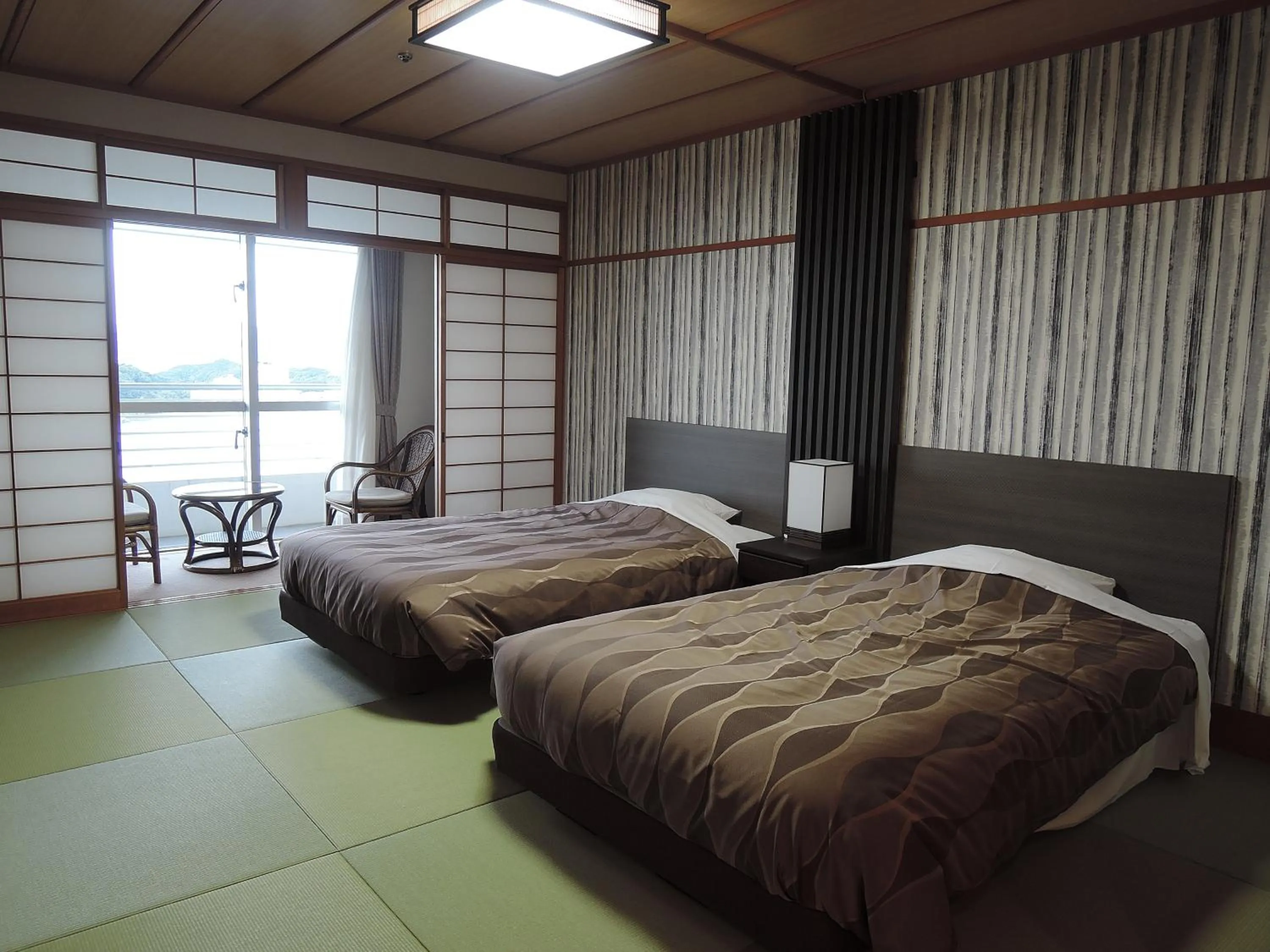 Twin Room with Tatami Floor and Shared Bathroom - single occupancy - Non-Smoking in The Gran Resort Elegante Shirahama