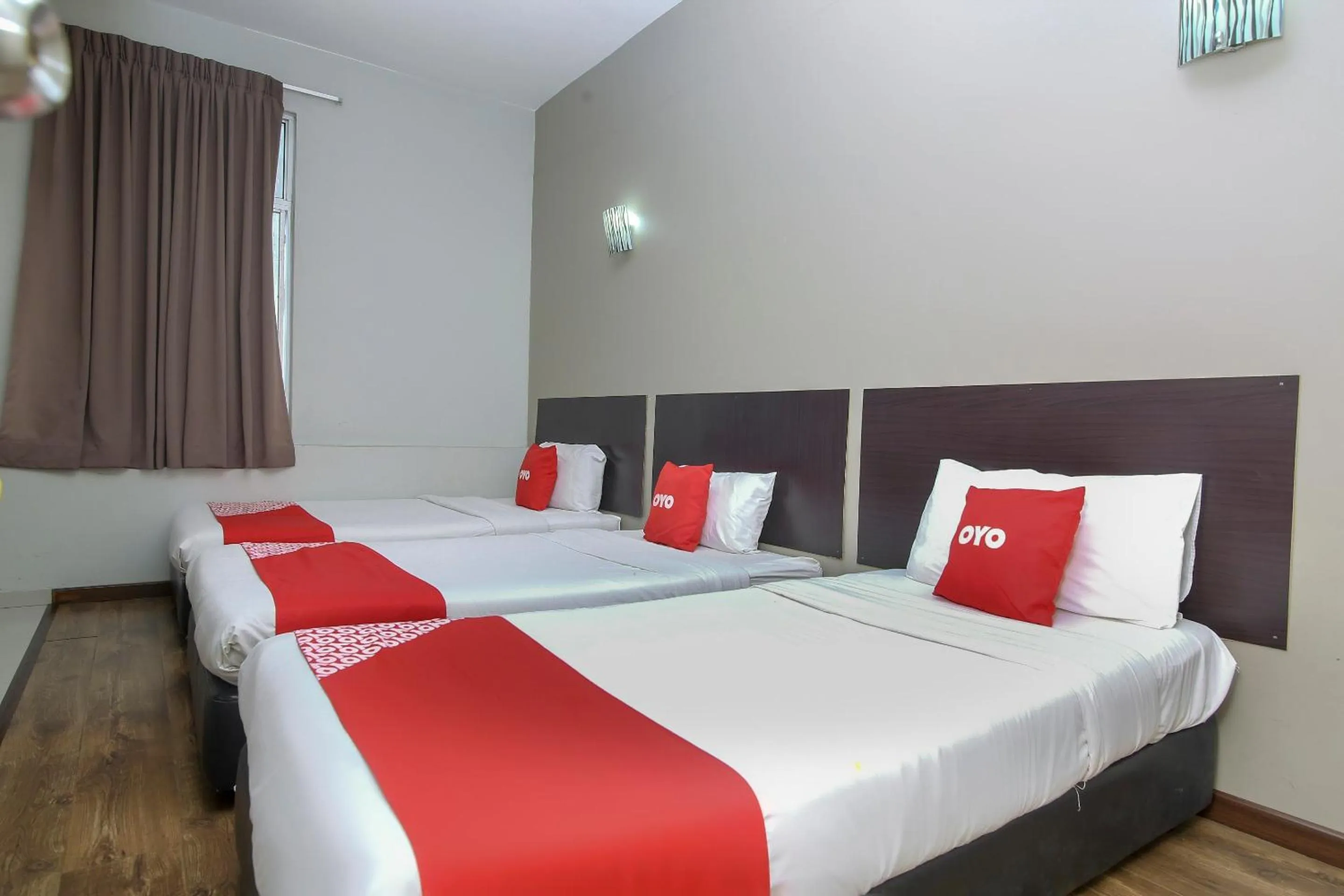 Deluxe Triple Room in Hotel O Nice Stay Three Six Five Services