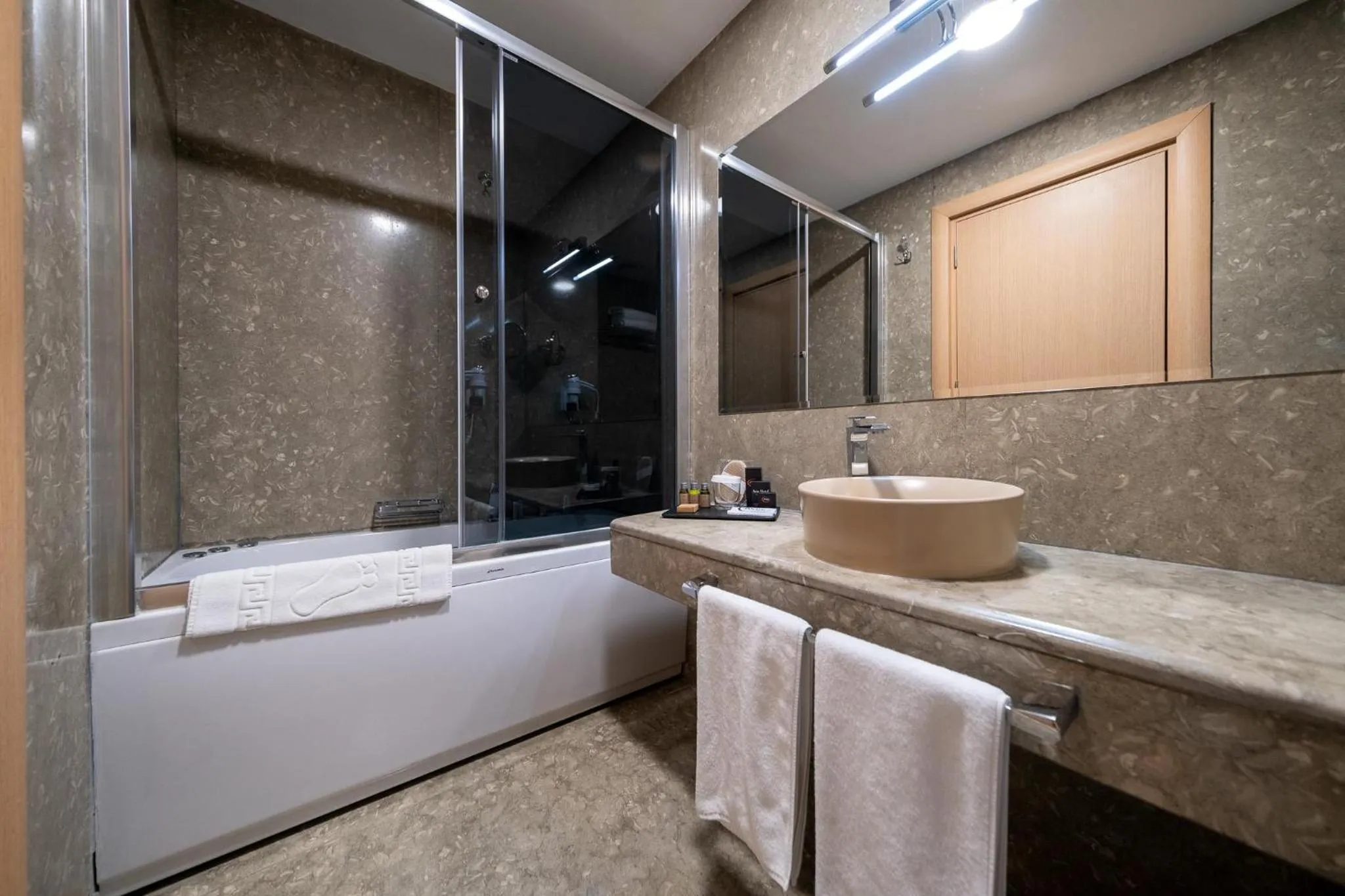 Shower in Avec Hotel
