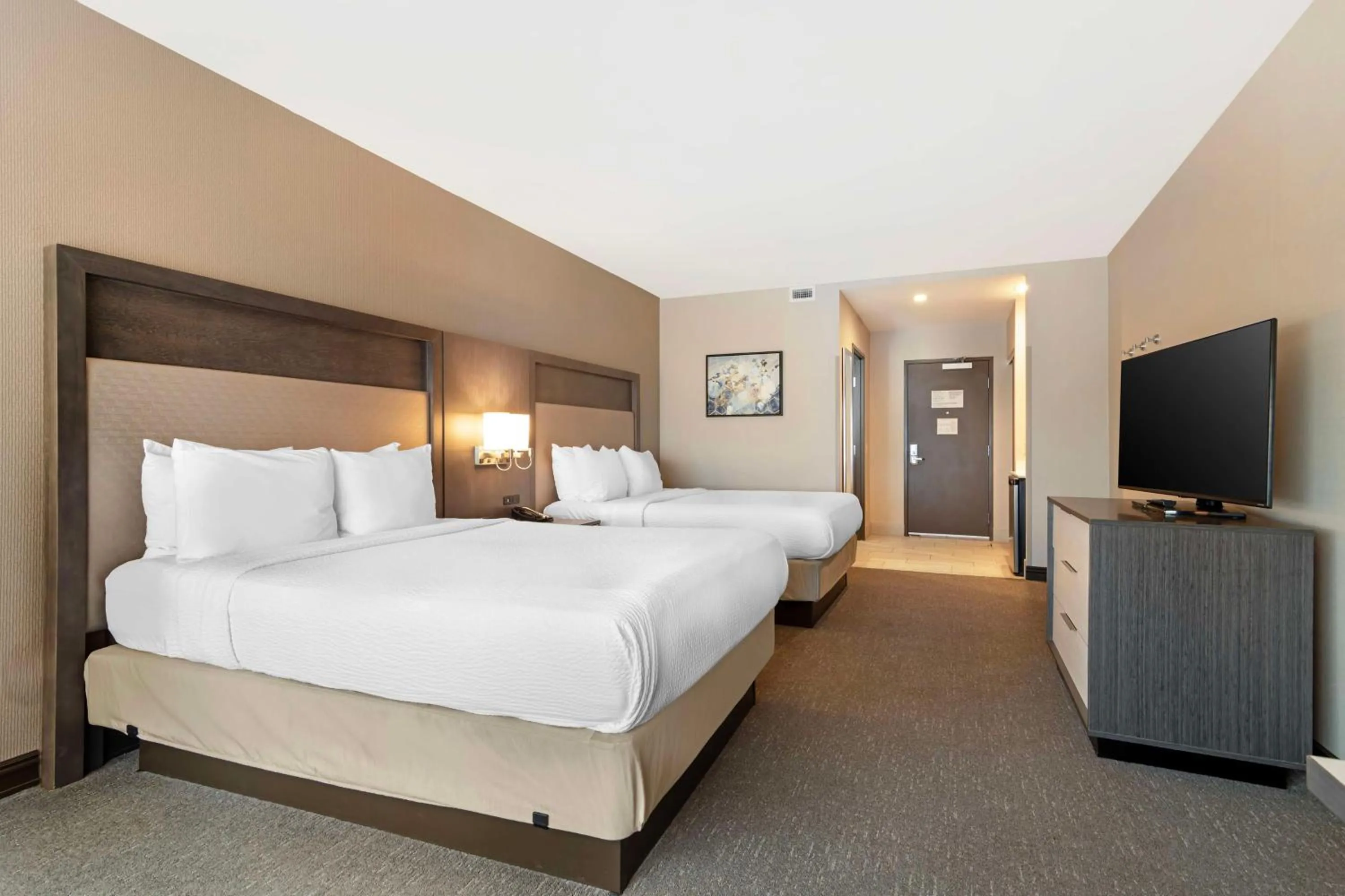 Queen Room with Two Queen Beds and Kitchenette in Best Western Plus Executive Residency Rigby's Water World Hotel