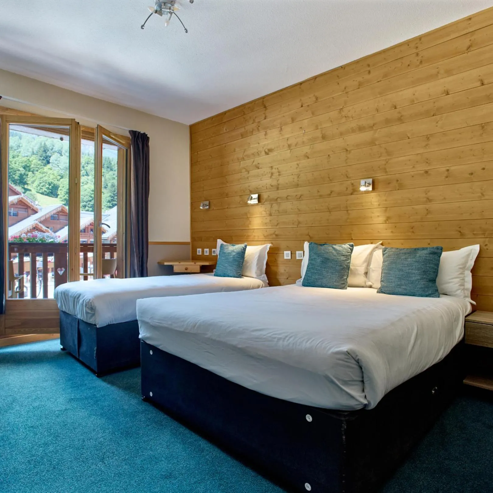 Family Room with Balcony - single occupancy in Hôtel Les Grangettes