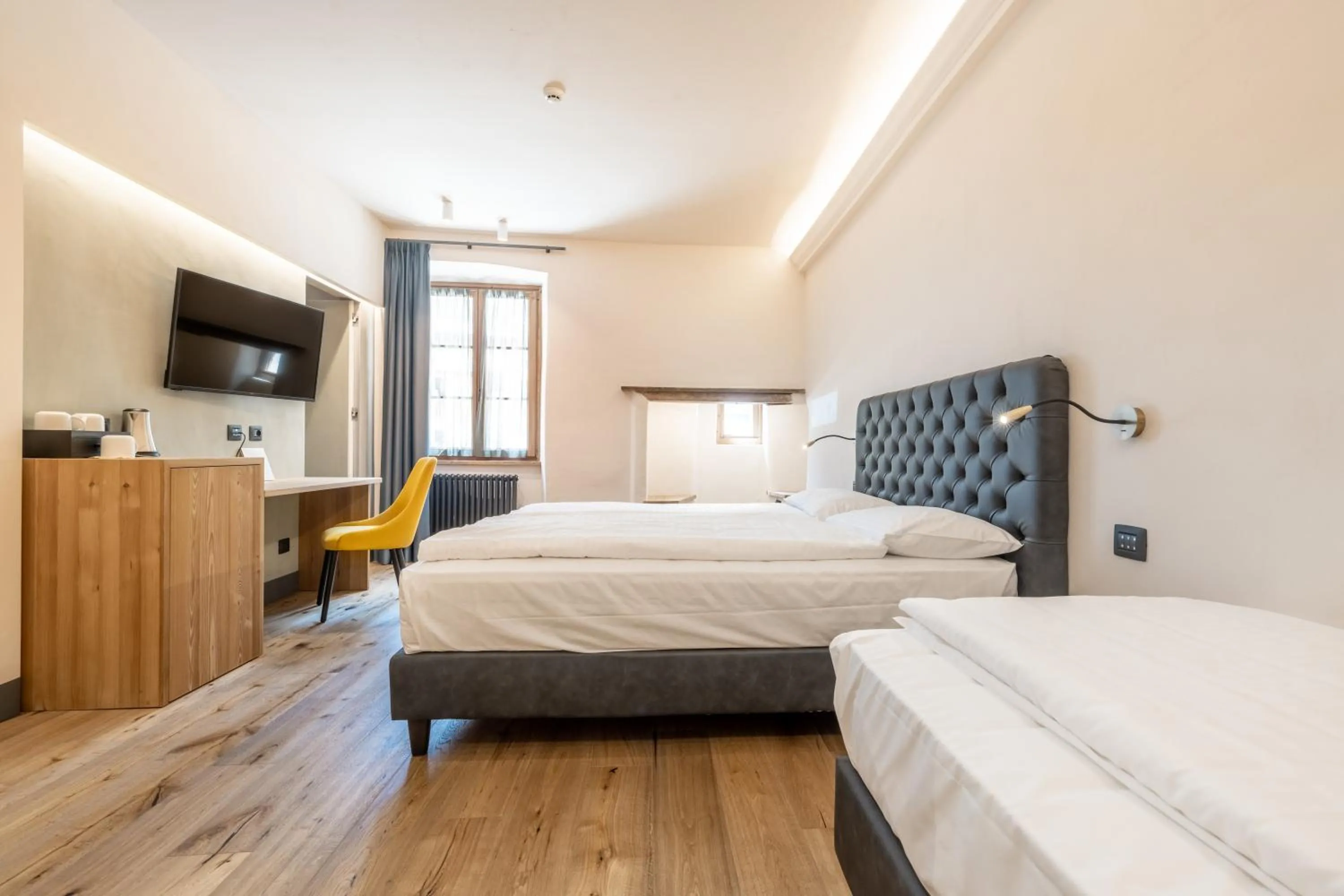 Superior Triple Room in Curt di Clement Eco Mobility Hotel