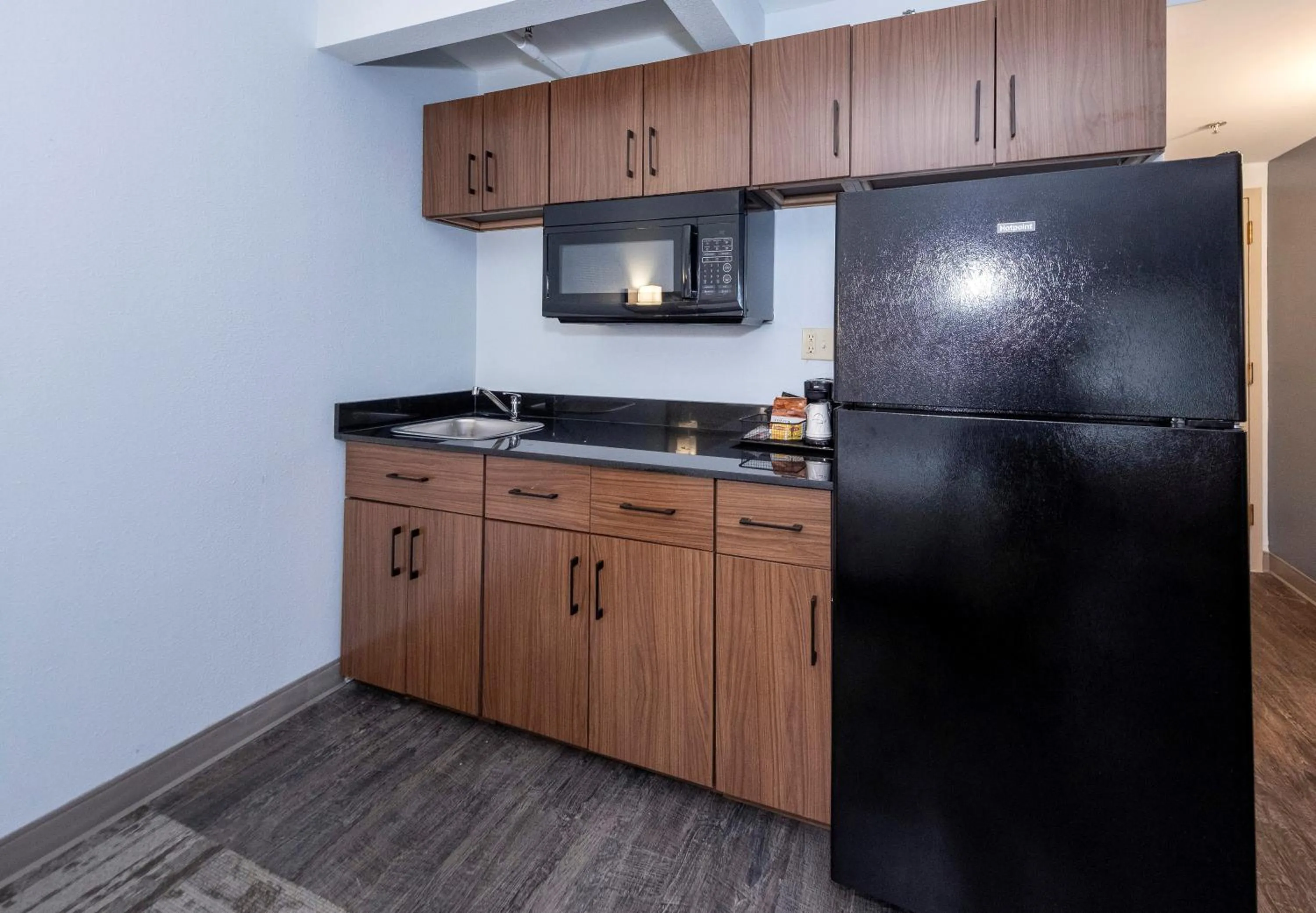 Studio King Room Disability Access Roll-In Shower Smoke Free in HomeTowne Studios by Red Roof Wilmington - New Castle