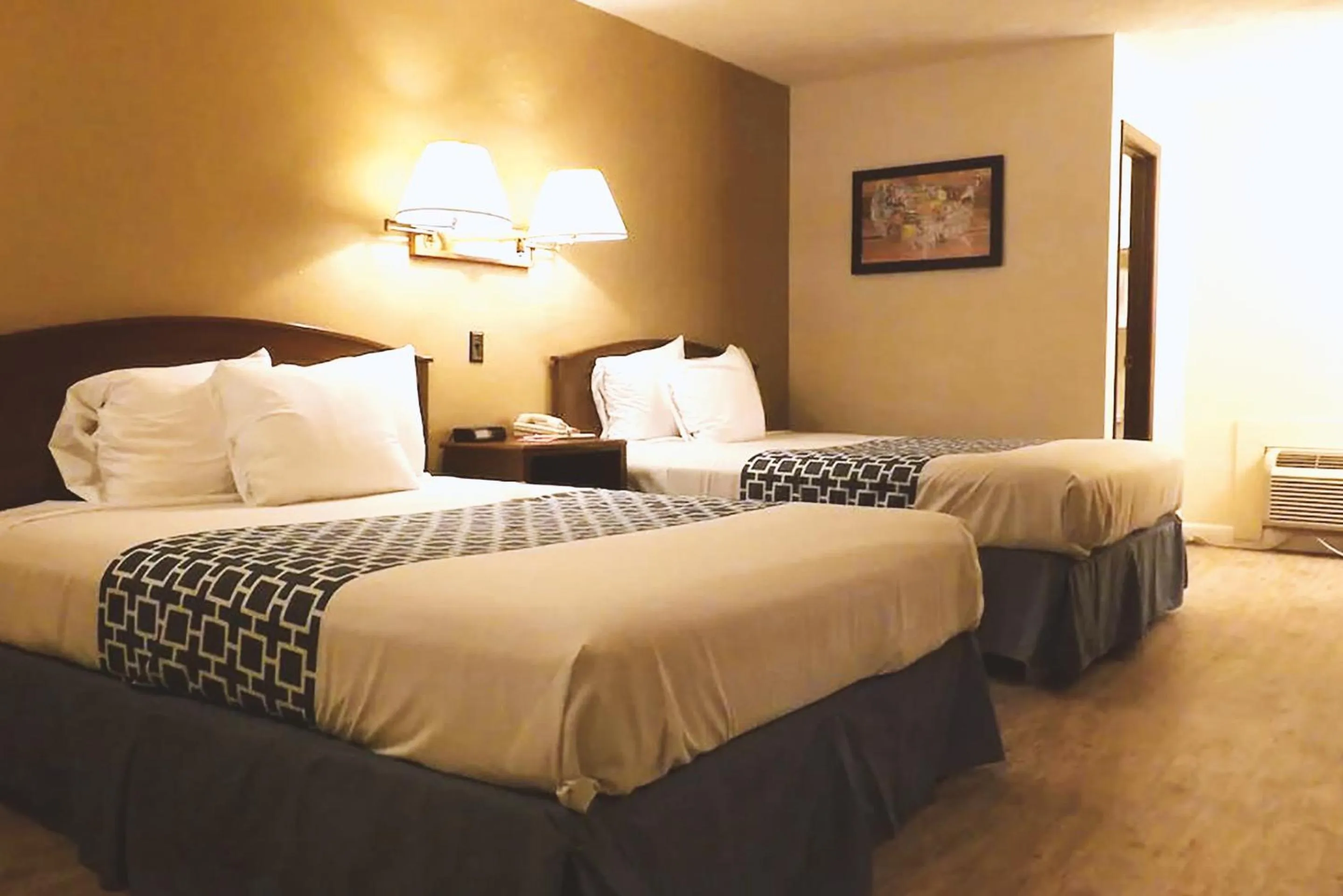 Deluxe Family Suite in Coratel Inn & Suites by Jasper McCook