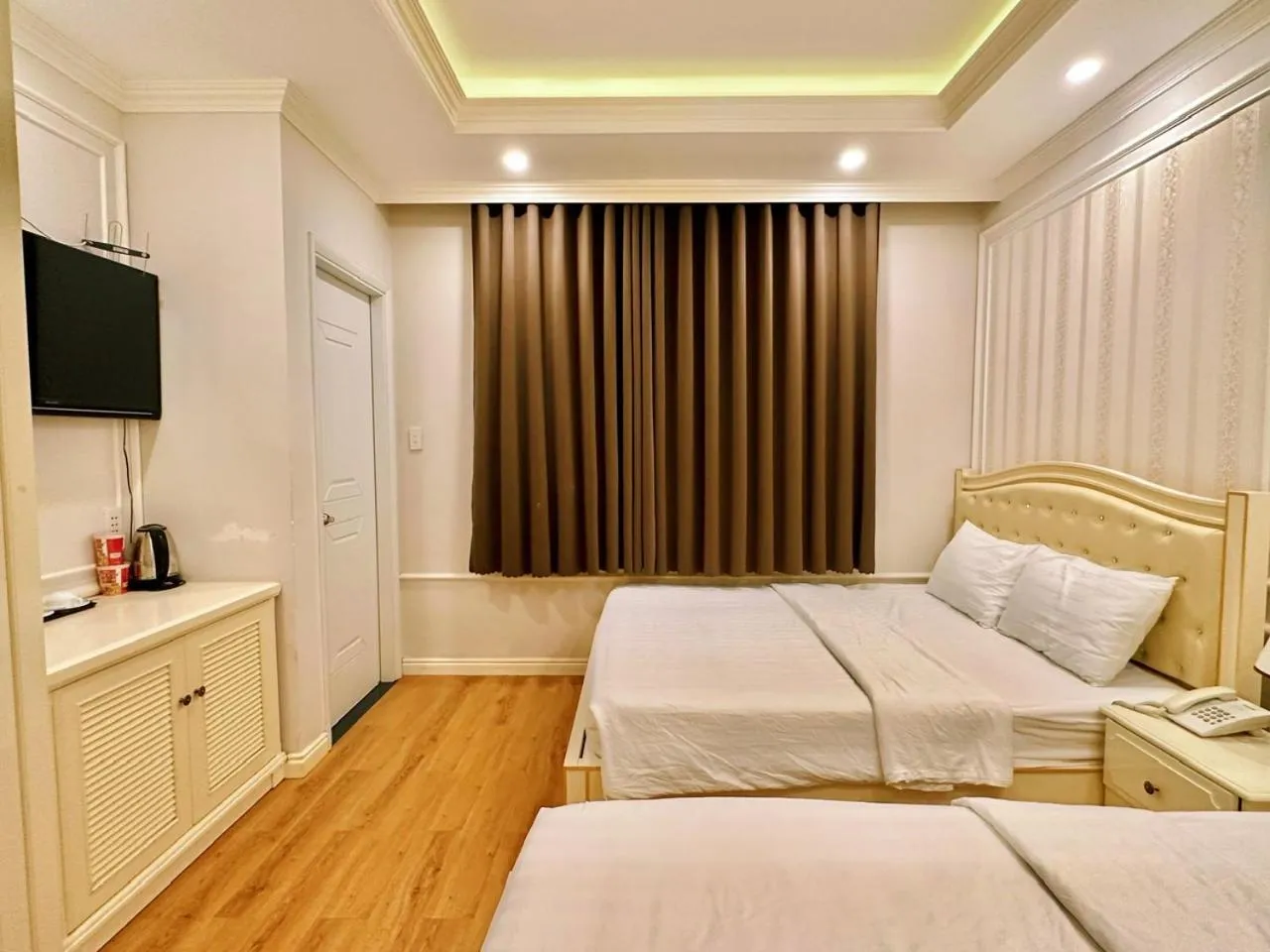 Standard Quadruple Room in Maya Hotel 2