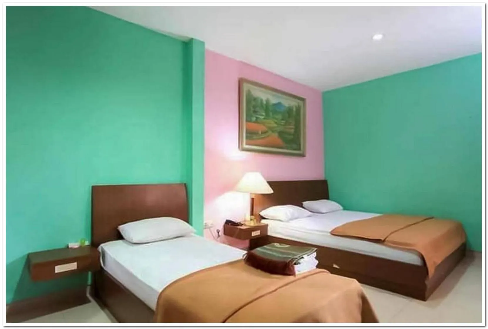 Deluxe Twin Room in The Nancy's Homestay Pekanbaru Mitra RedDoorz