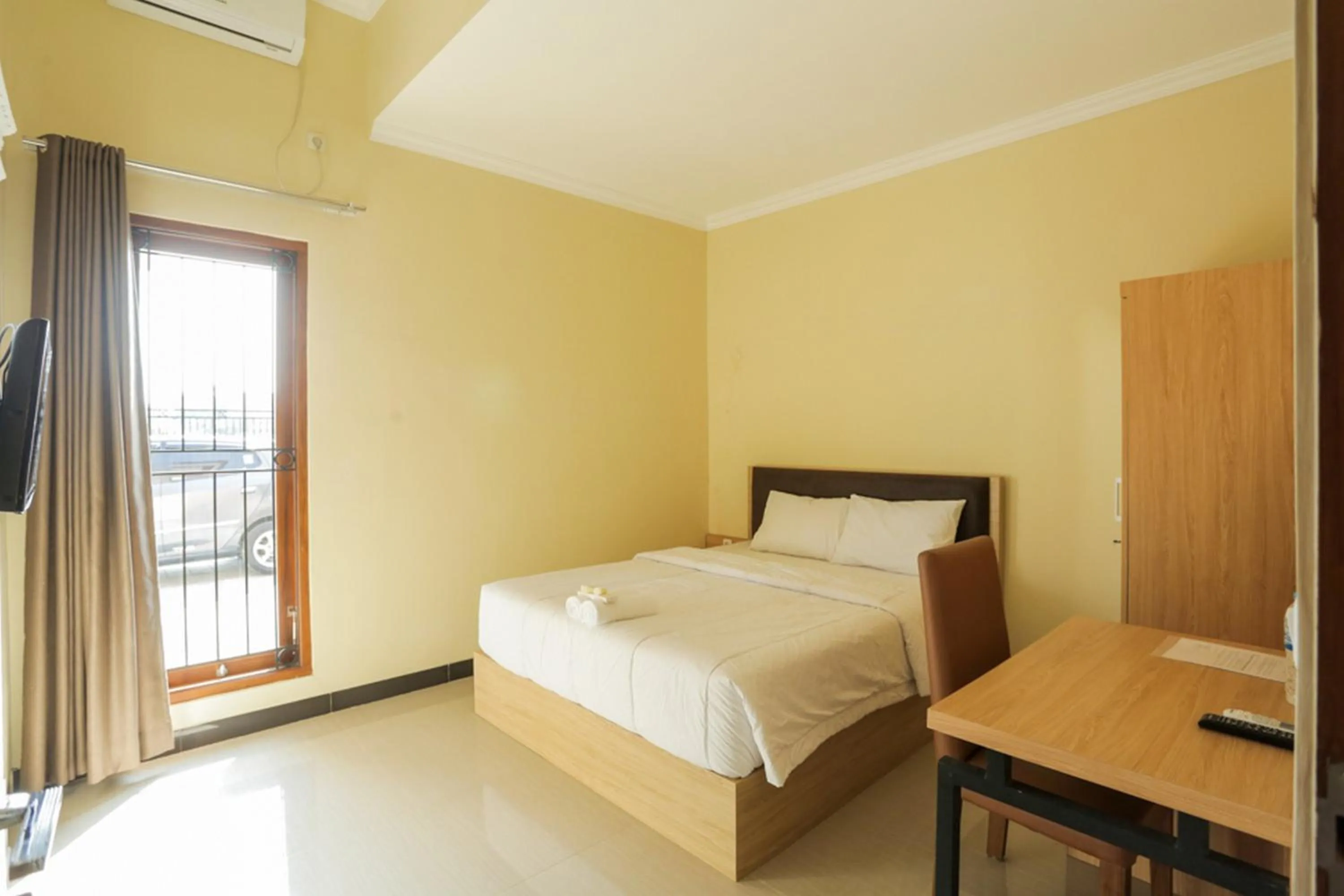 Deluxe Room in IDR Green Guest House Syariah Mitra RedDoorz