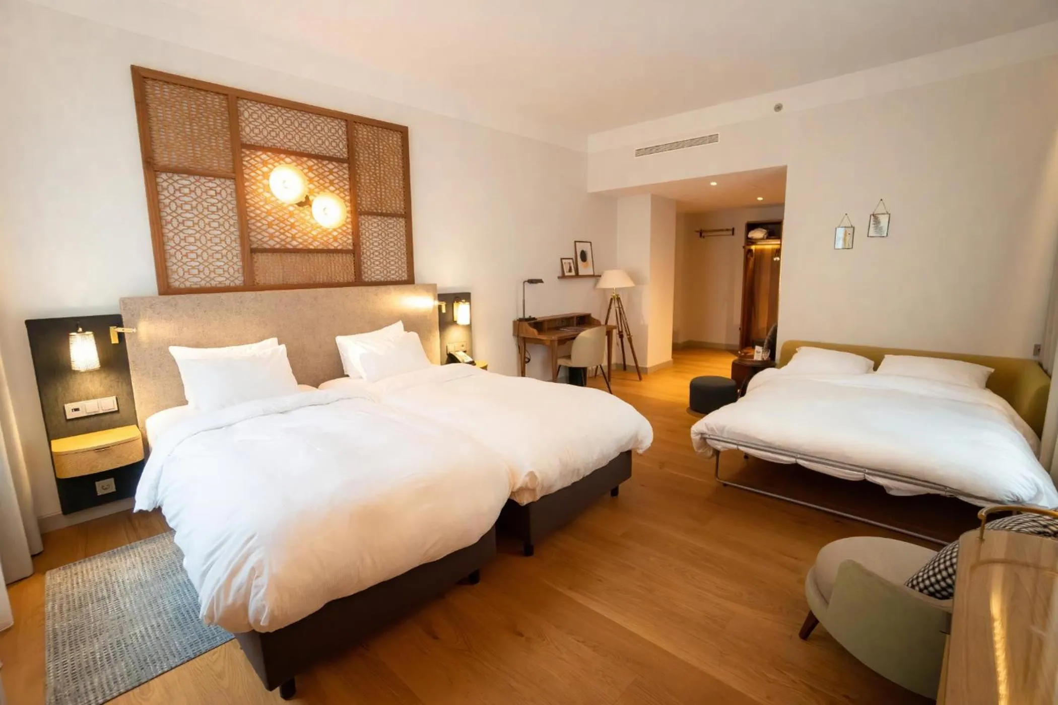 Premium Twin Room with Sofa in voco The Hague by IHG