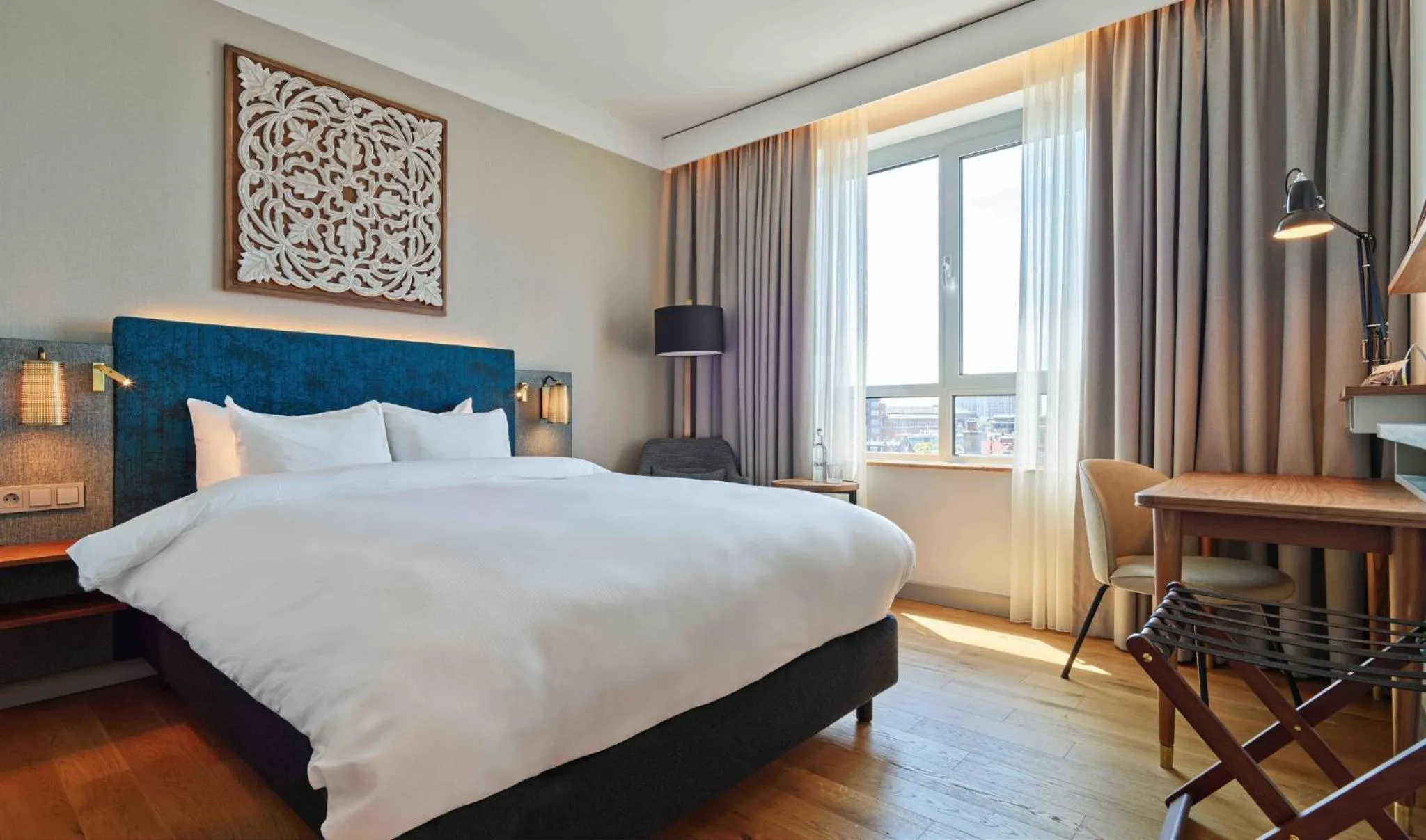 Premium Queen Room with Balcony and City View in voco The Hague by IHG
