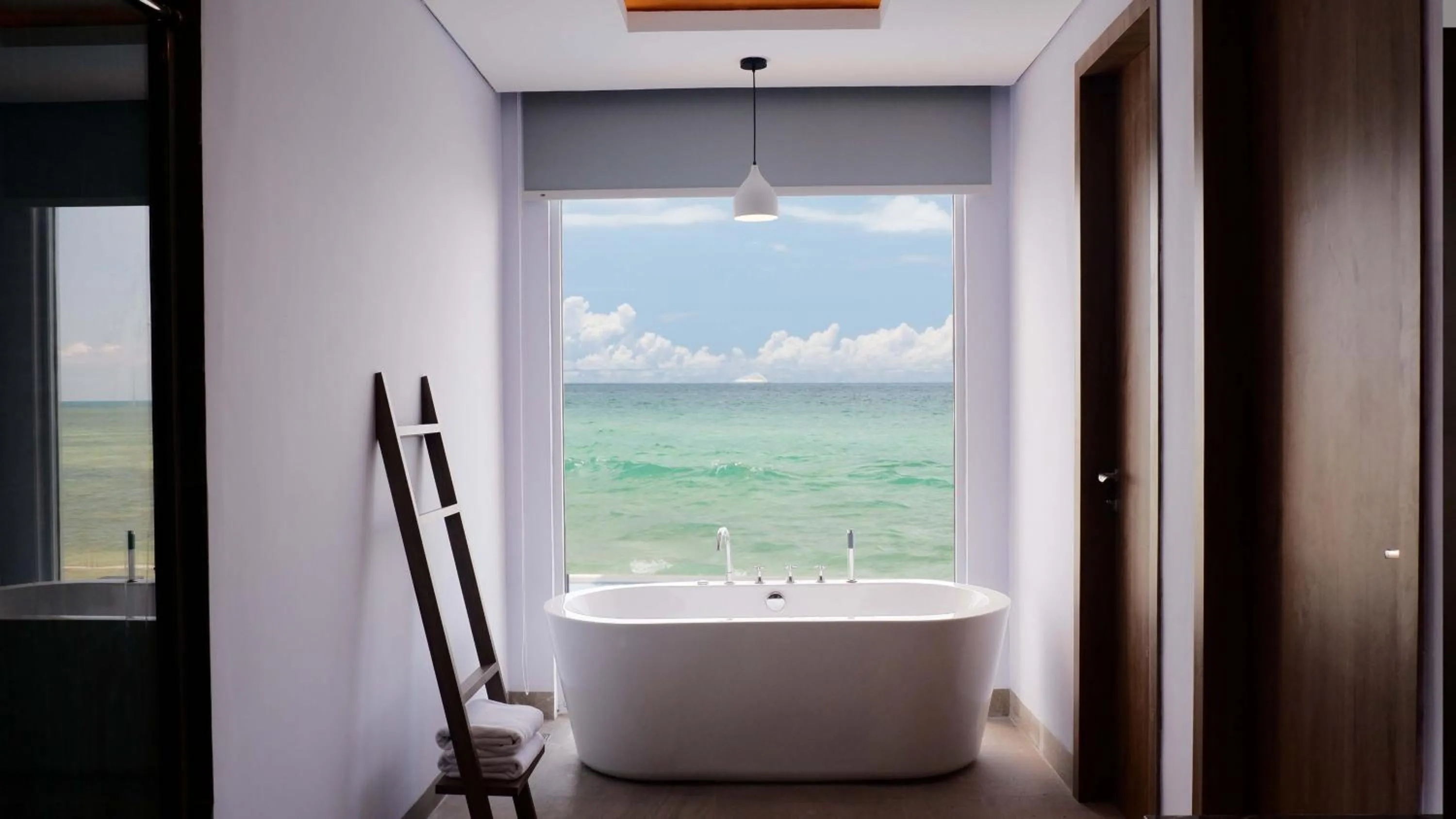 Villa Aqua Junior Suite with Sea View in One of A Kind Resort @Trikora Beach - Bintan