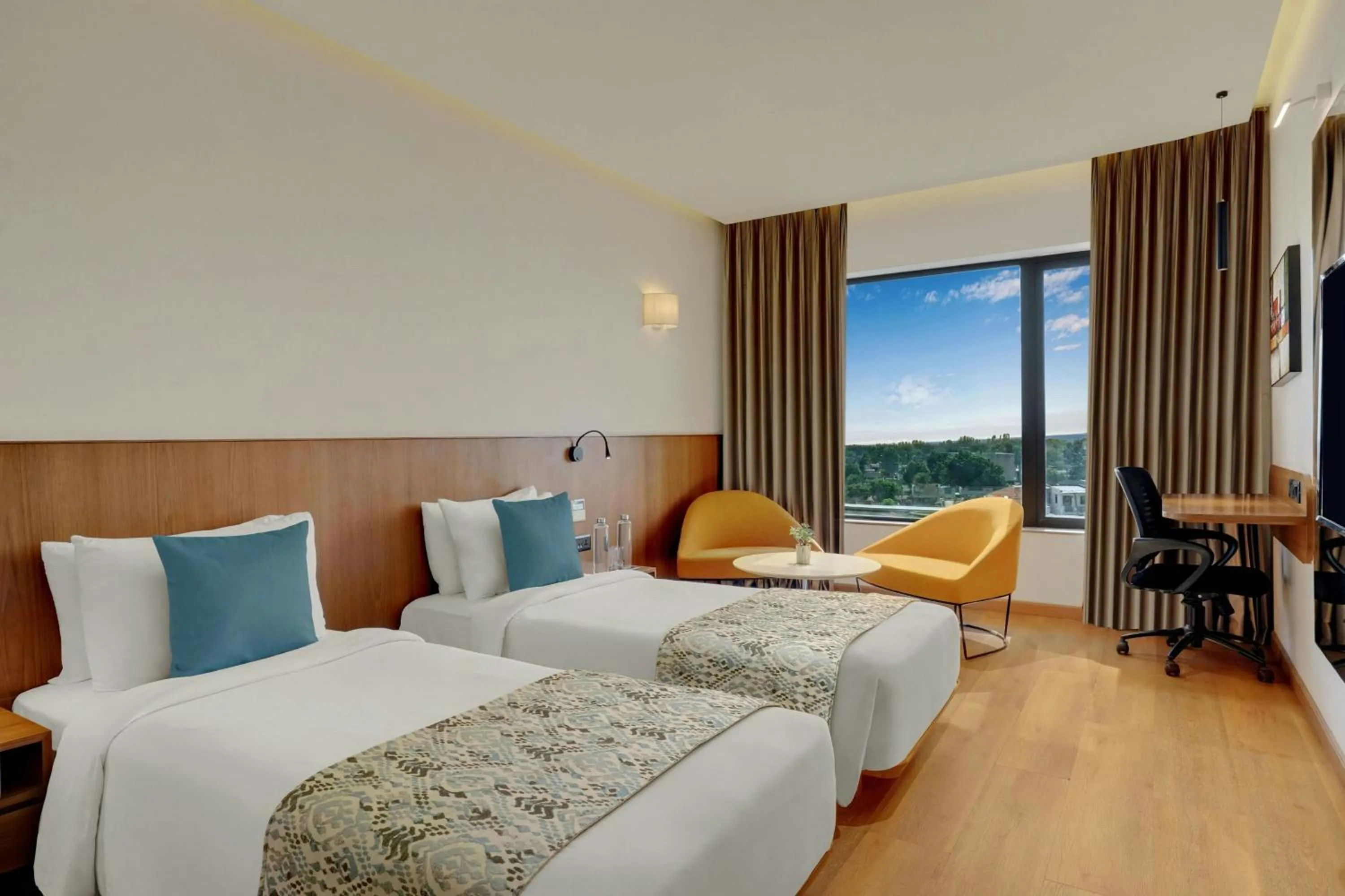 Winter Green Twin Room with City View - single occupancy in The Fern Residency, Jamnagar, Series by Marriott