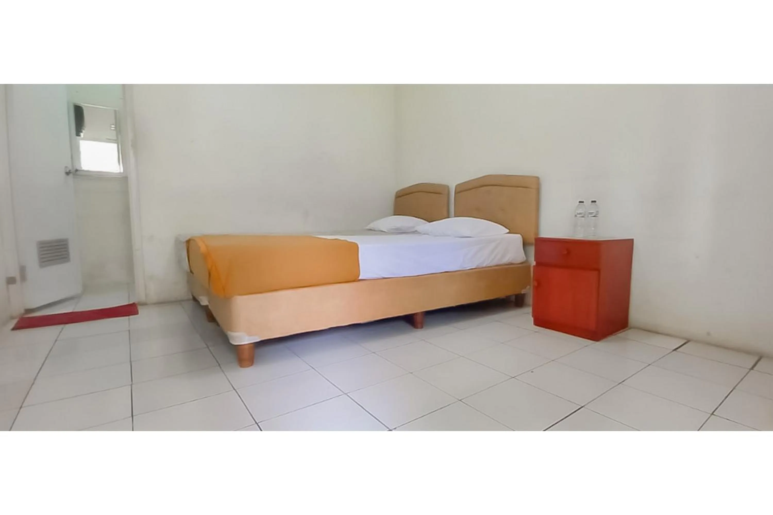 Standard Double Room in Hotel Sri Indrawati Puncak Mitra RedDoorz