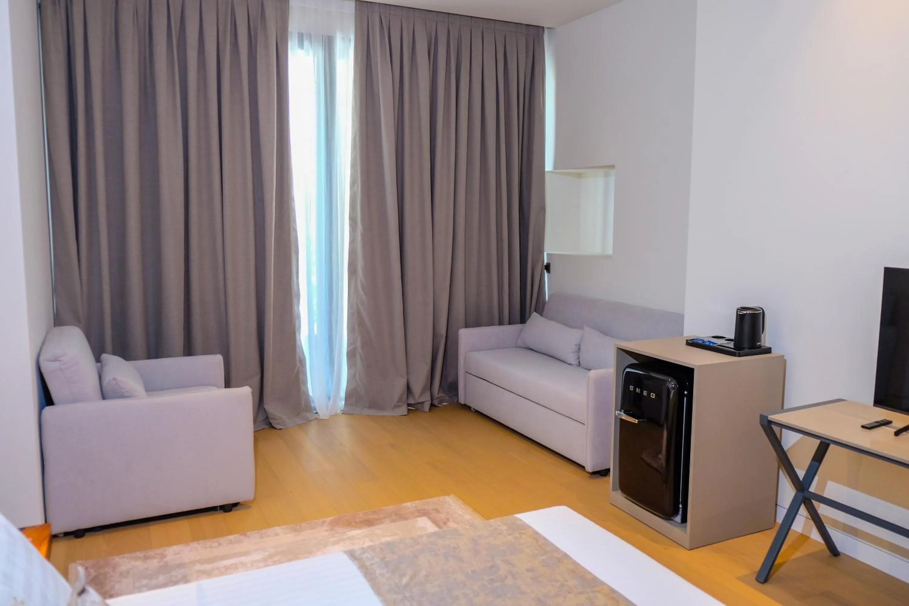 Family Room with Balcony in Chic Boutique Hotel Vlore