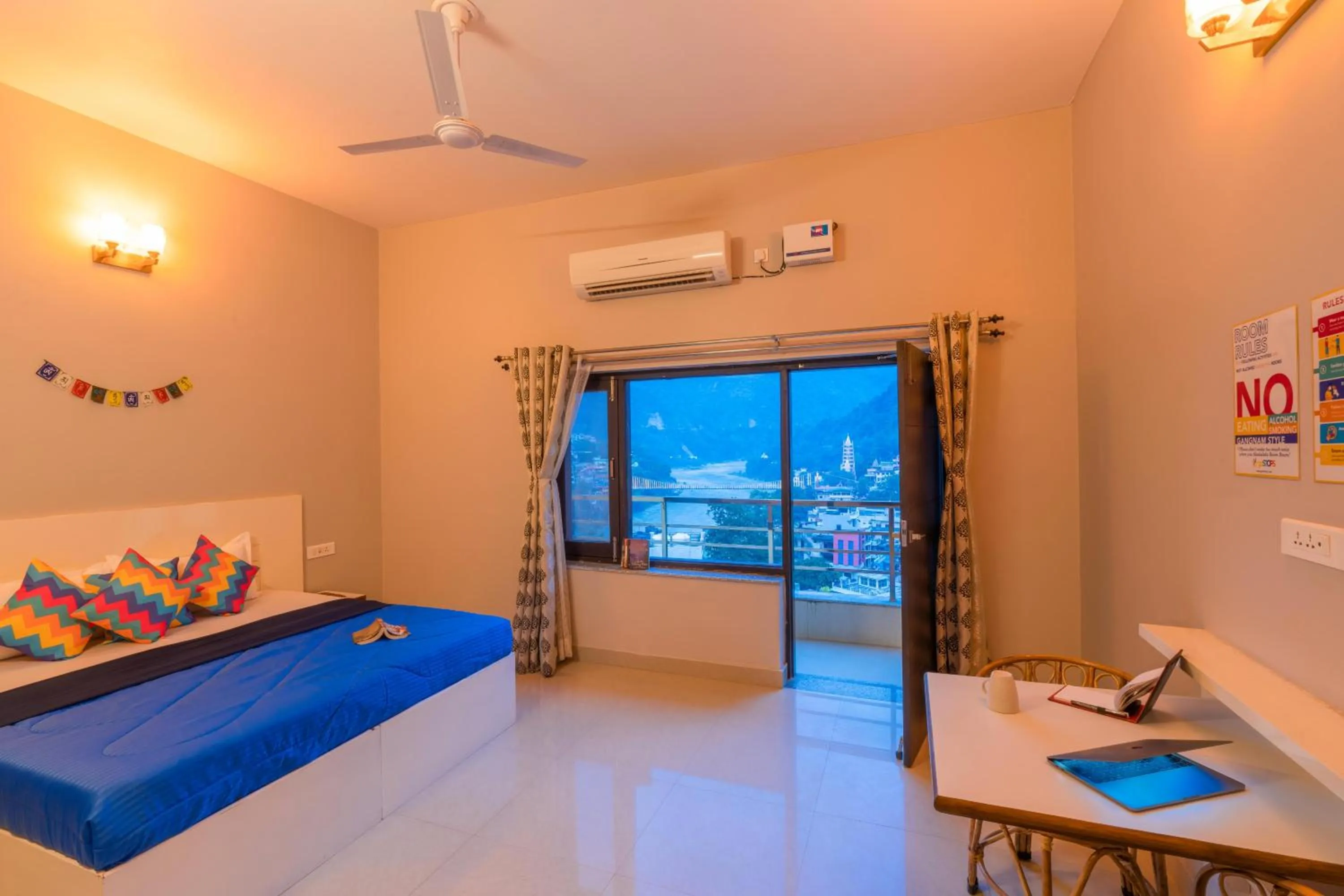 Deluxe Private A/C Room with Panoramic View and Ensuite Bathroom in goSTOPS Rishikesh, Lakshman Jhula