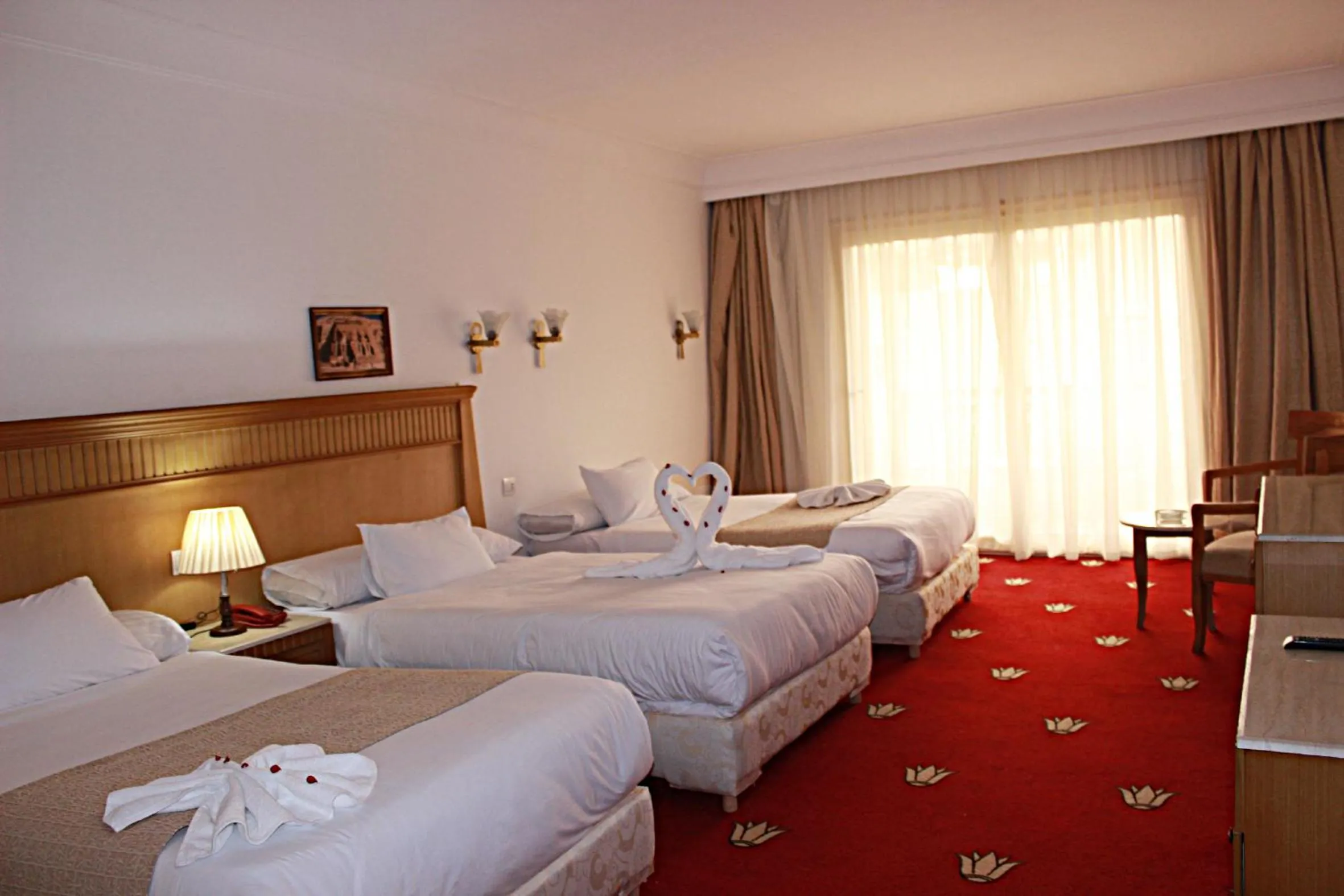 Deluxe Triple Room in Regency Pyramids Hotel