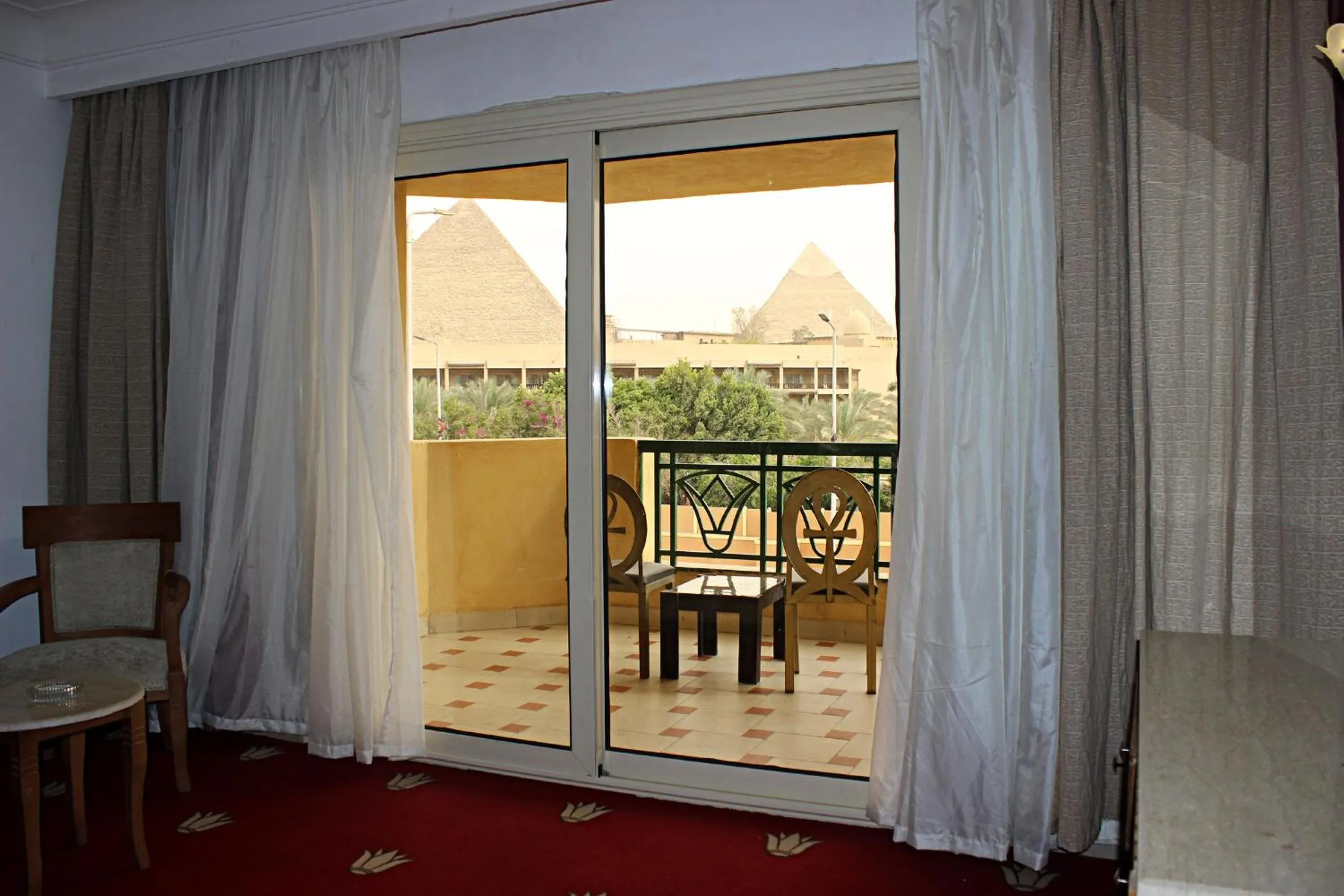 Deluxe Junior Suite with Pyramids View in Regency Pyramids Hotel
