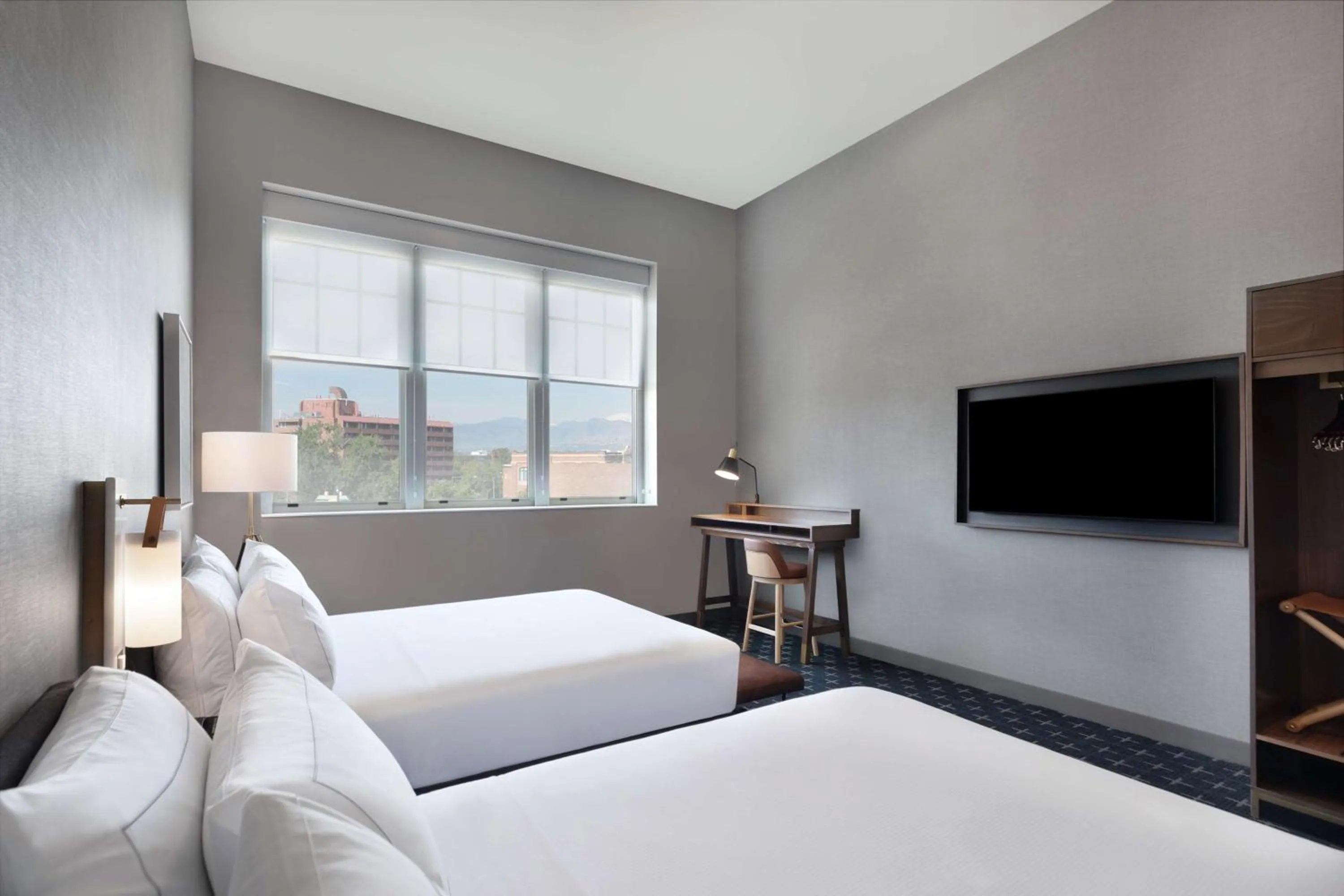 Queen Room with Two Queen Beds and Bath Tub - Mountain View/Disbility Access in The Slate Hotel Denver Downtown, Tapestry by Hilton