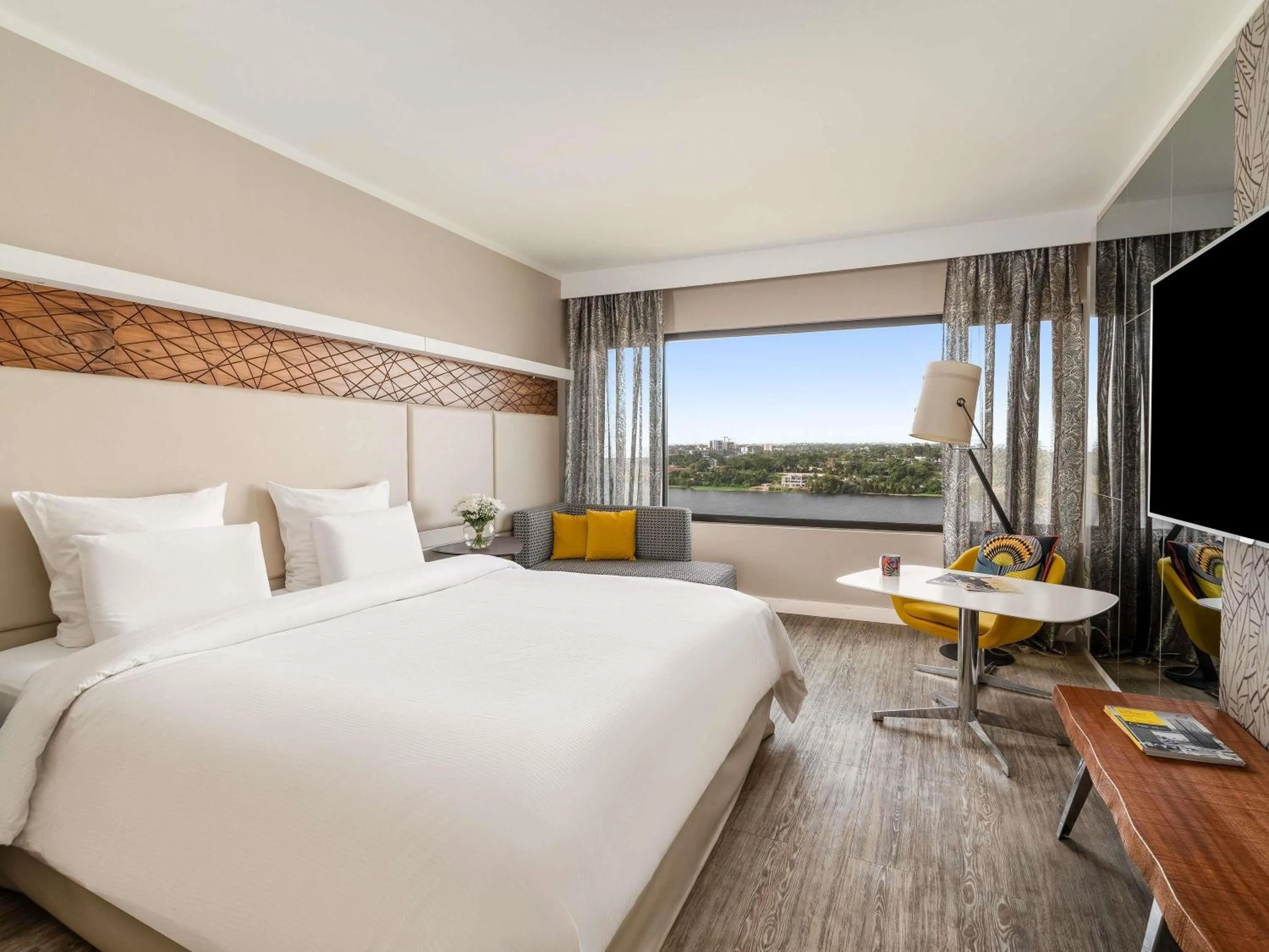 Premium Superior King Room with Lagoon View in Pullman Abidjan