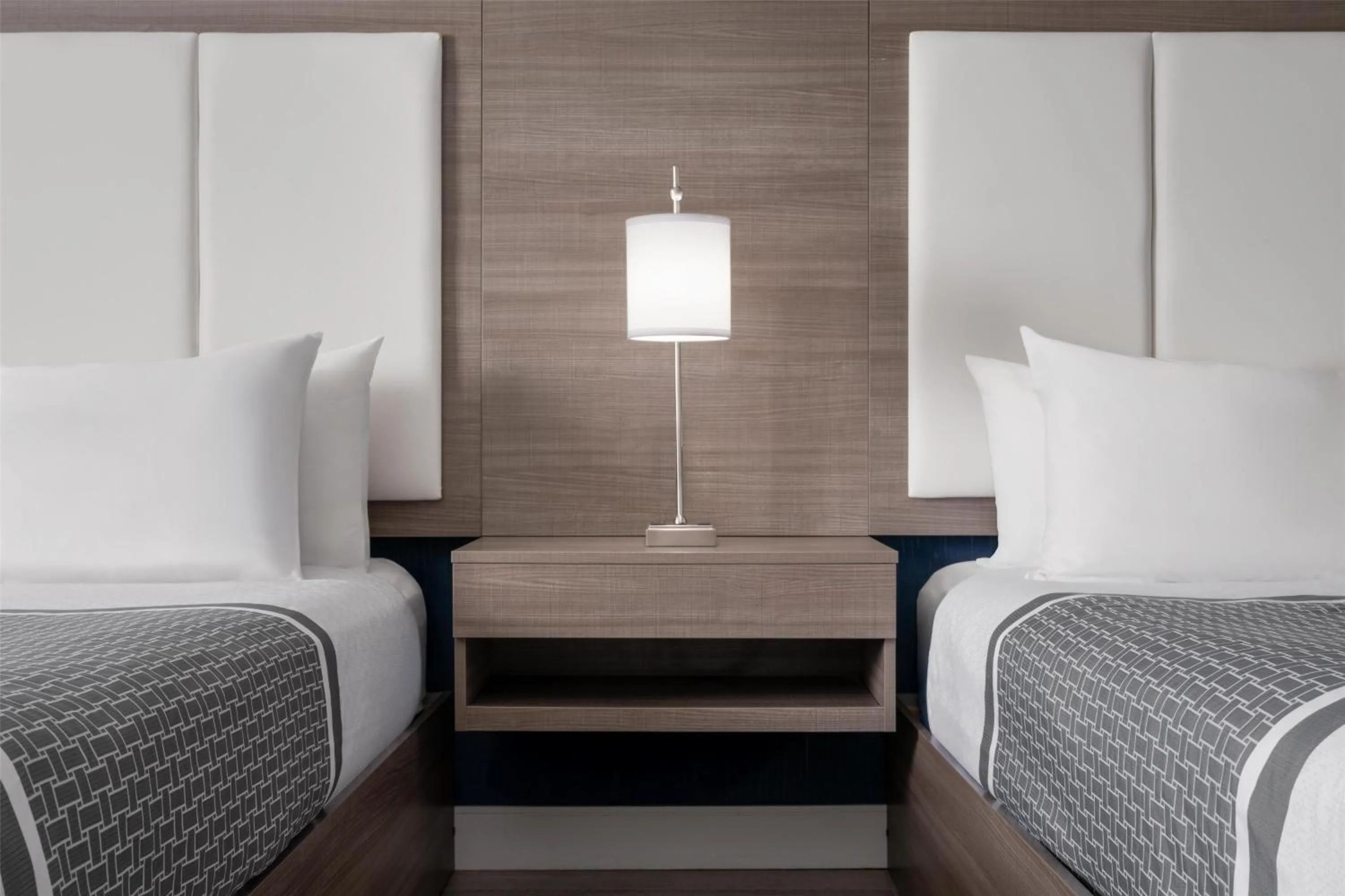 Queen Room with Two Queen Beds and Mobility Accessible Roll-In Shower in Best Western Plus Gateway to the Falls