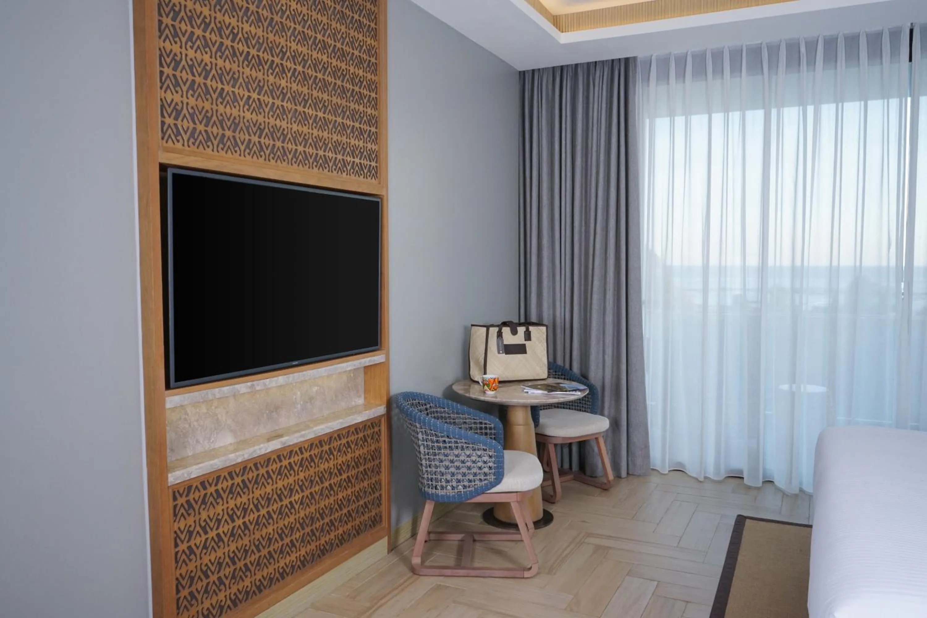 Deluxe King Room with Balcony and Ocean View in Pullman Lombok Merujani Mandalika Beach Resort