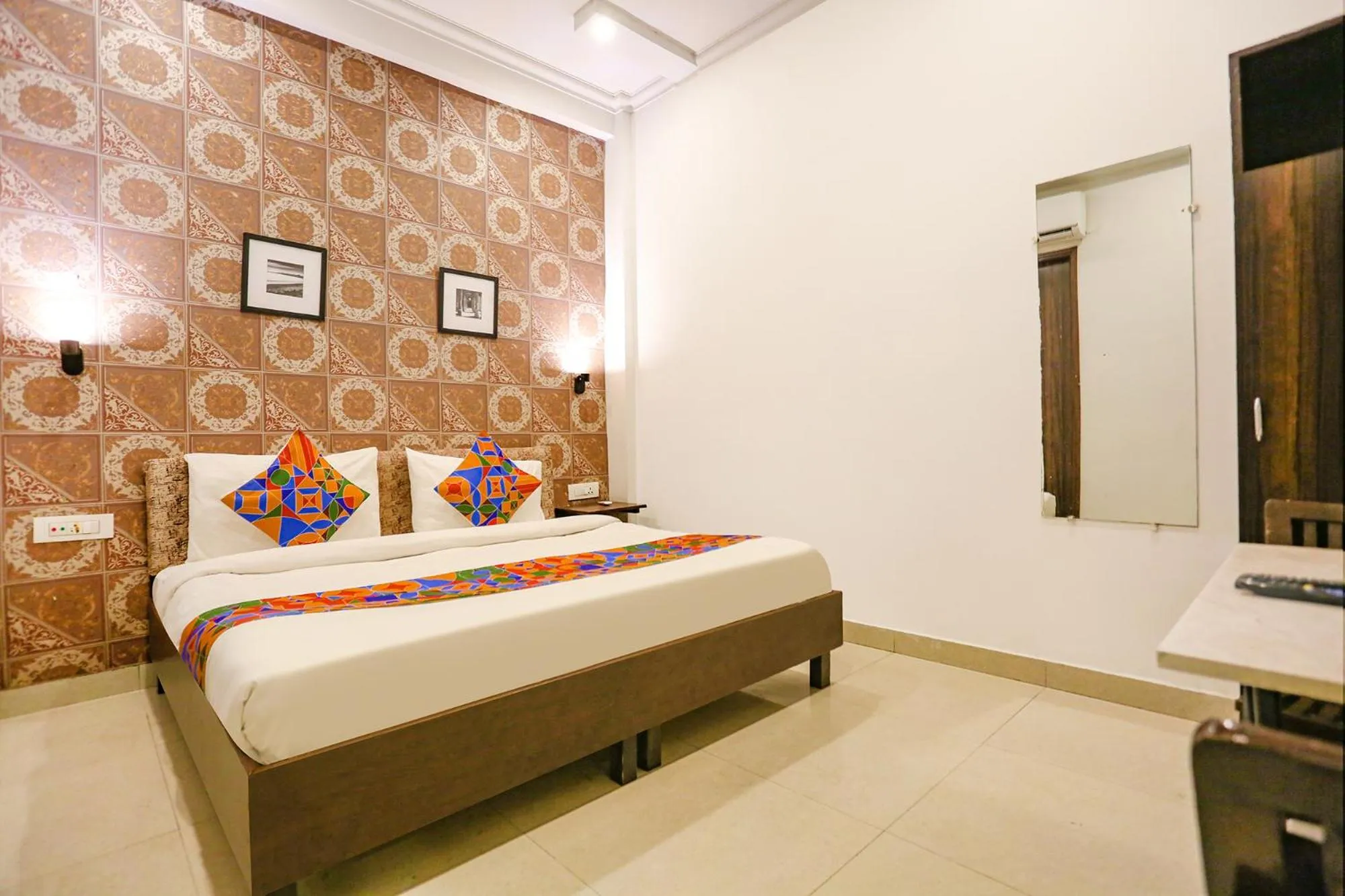 Deluxe Room - single occupancy in FabExpress Novel Suites - Nr Yashobhoomi Convention Centre