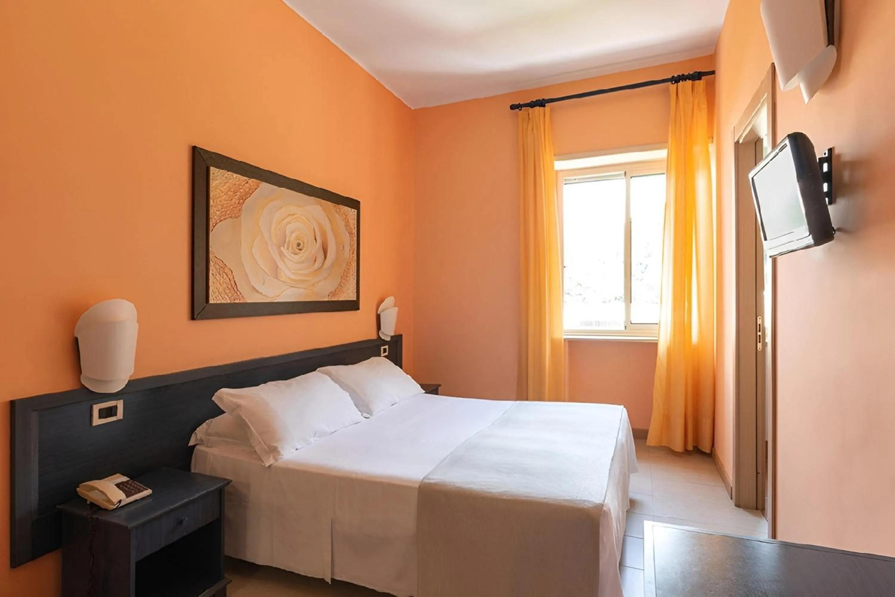 Bed in Hotel Serapo
