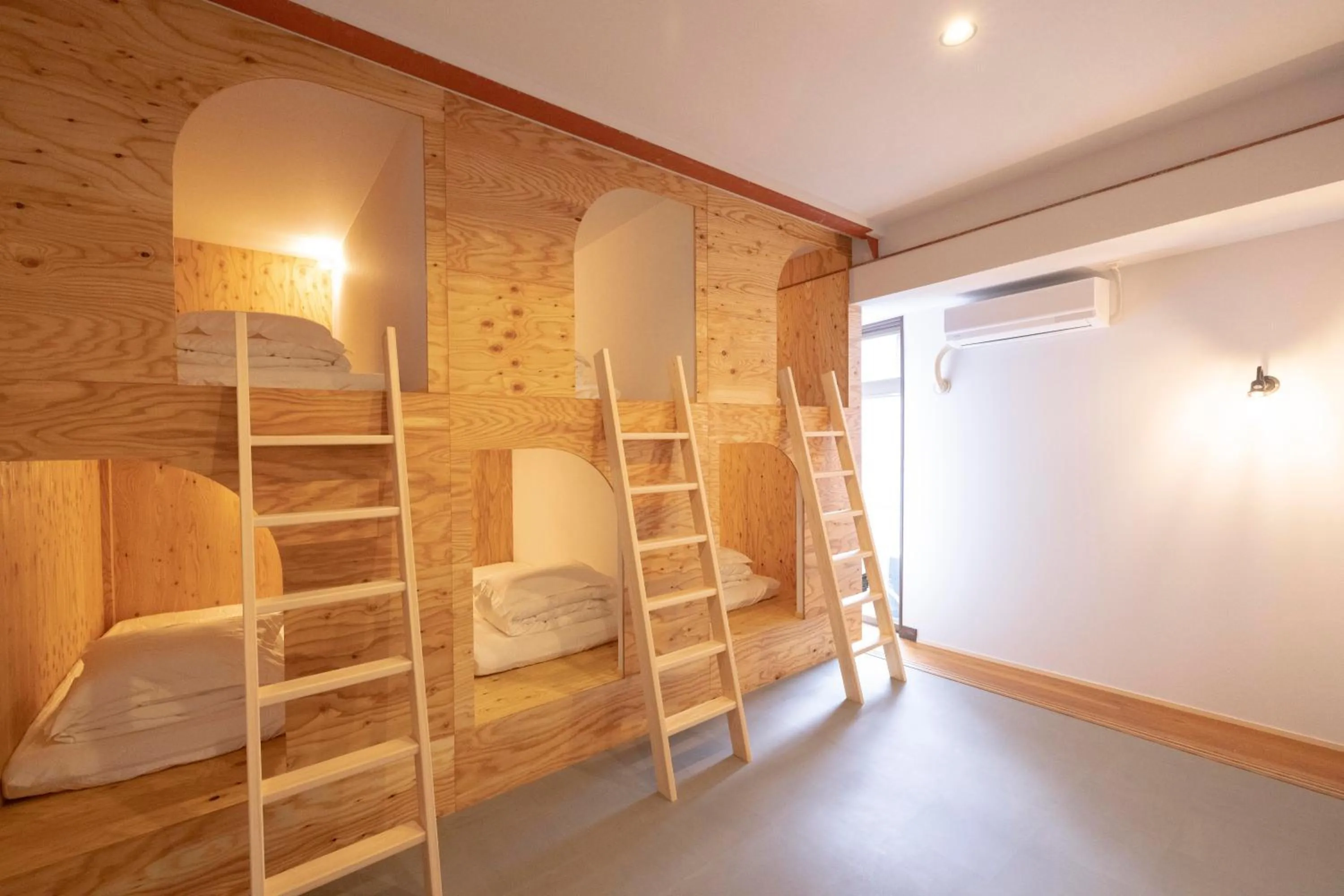 Bed in 6-Bed Mixed Dormitory Room in Coliving & Cafe SANDO