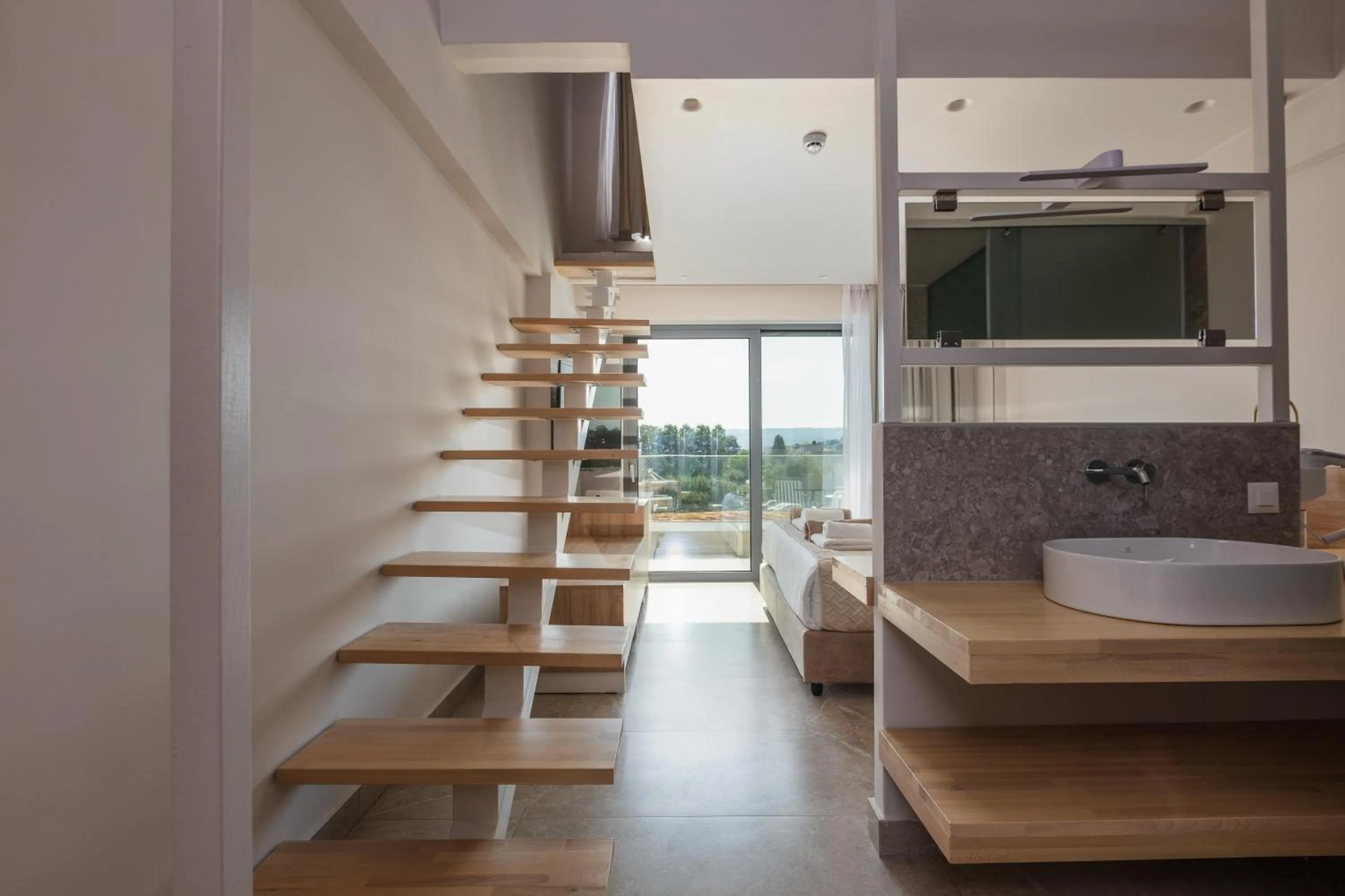 Junior Suite Split Level with Pool View in Nima Boutique Hotel