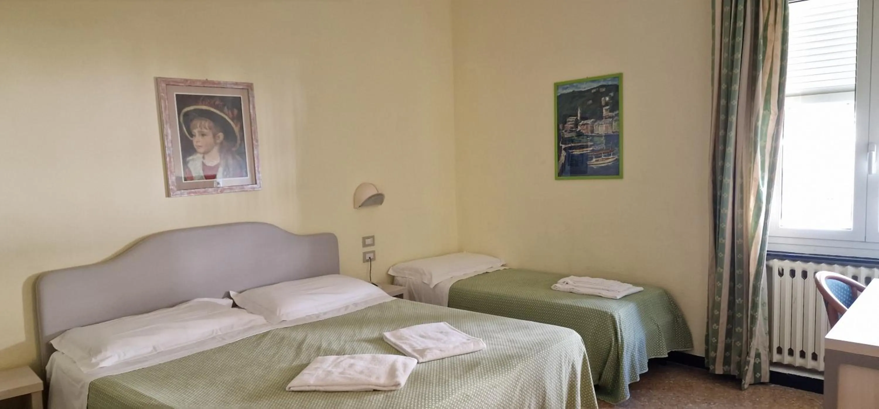 Standard Quadruple Room in Hotel Sud Est by Fam Rossetti