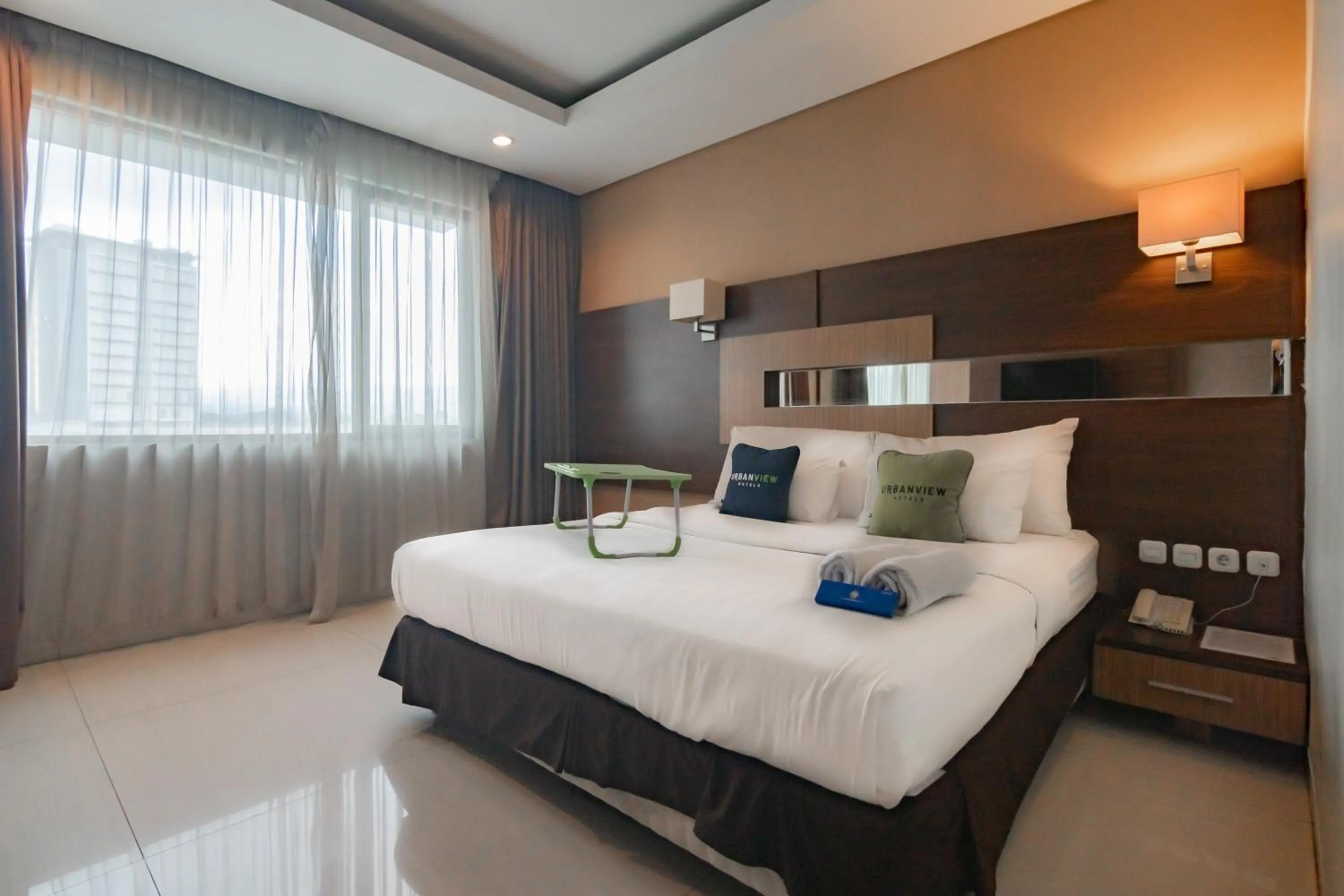 Standard Double Room in Urbanview Hotel Newton Riau Bandung by RedDoorz